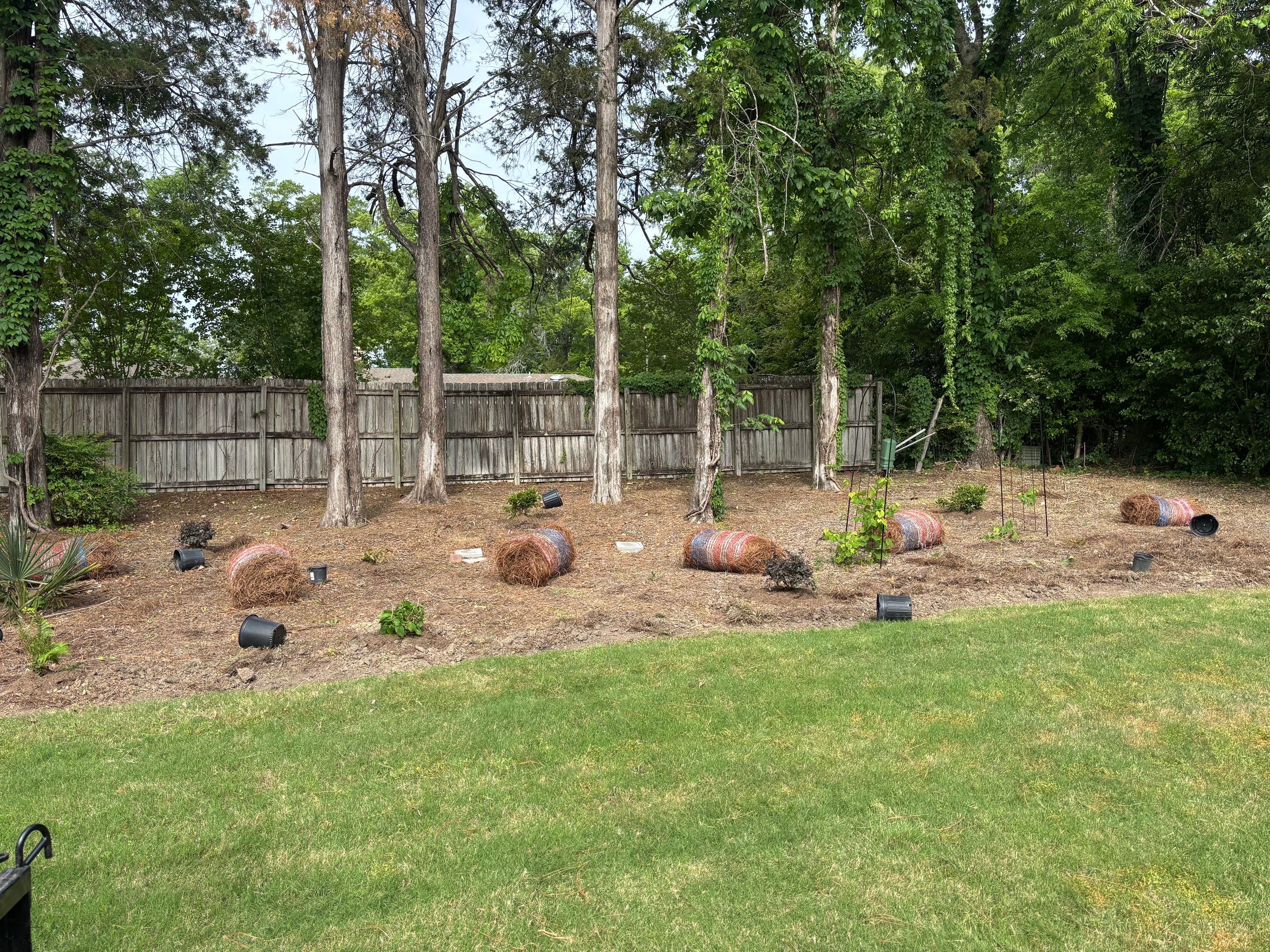 Backyard Pine Straw Mulching and Landscape Bed Preparation in Montgomery