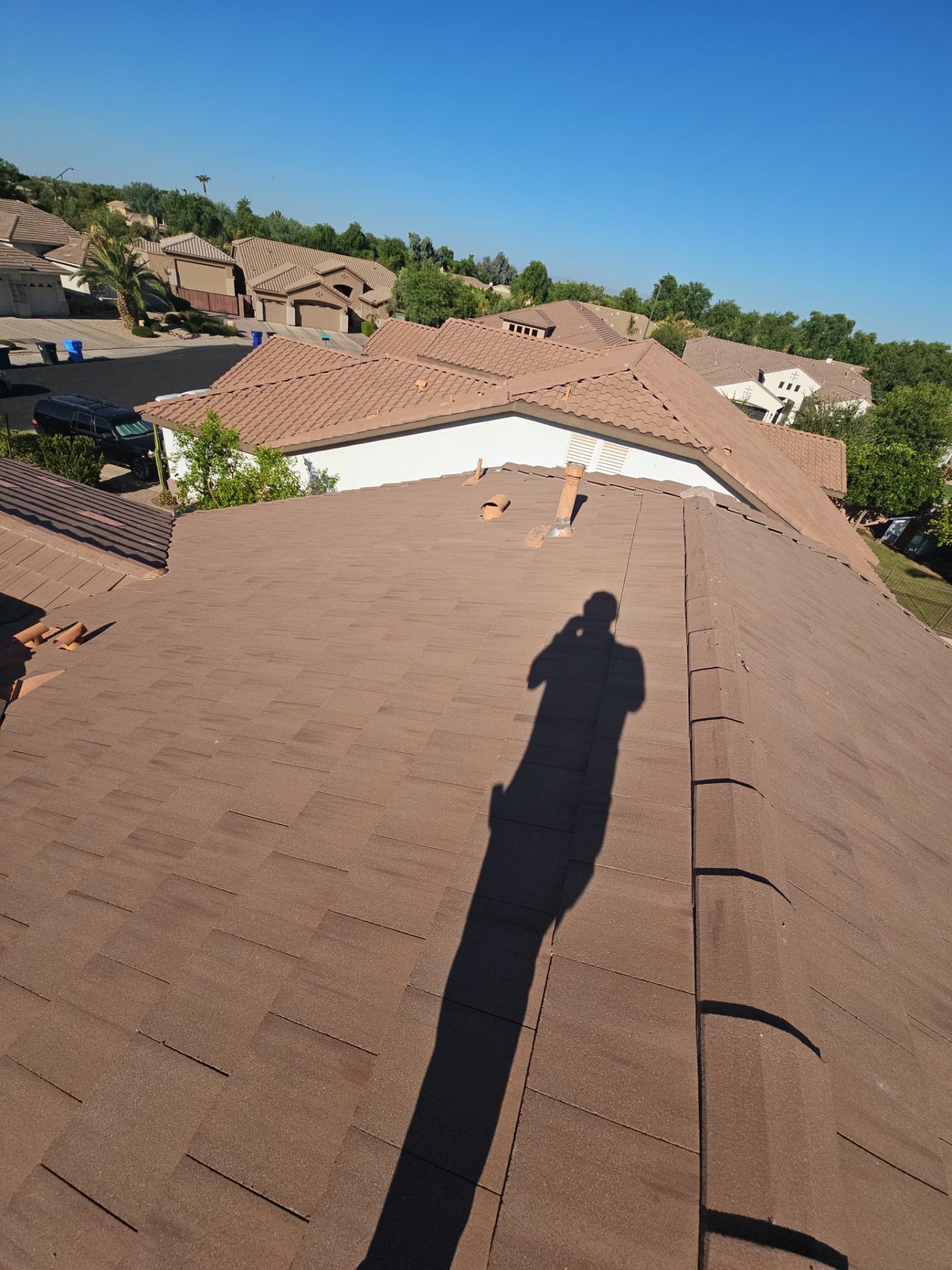 Residential Roofing Installation using Concrete Tile by Weather-Tite Exteriors LLC
