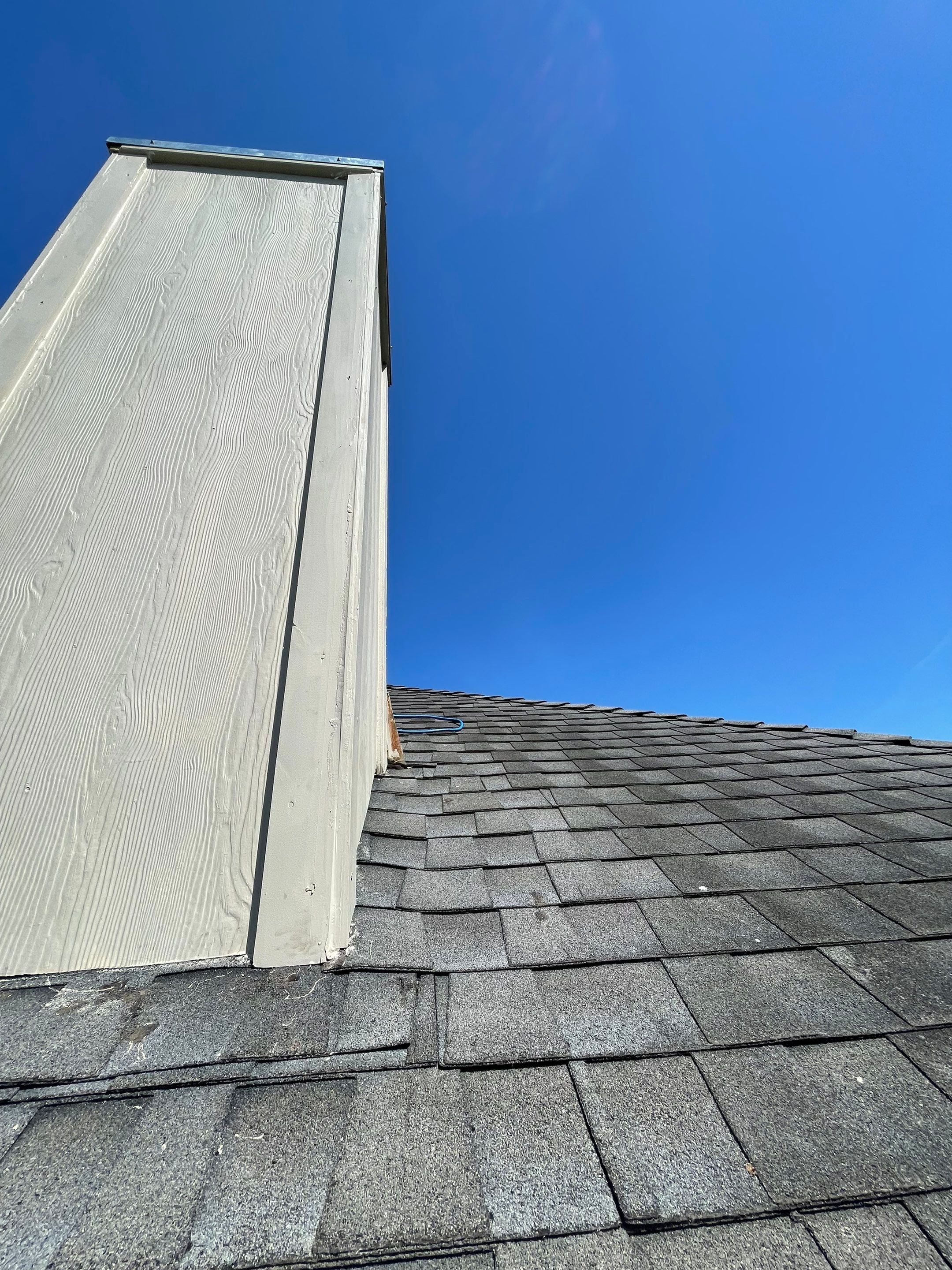 Residential Roofing Repair Replacing Chimney Cap by Lighthouse Roofing
