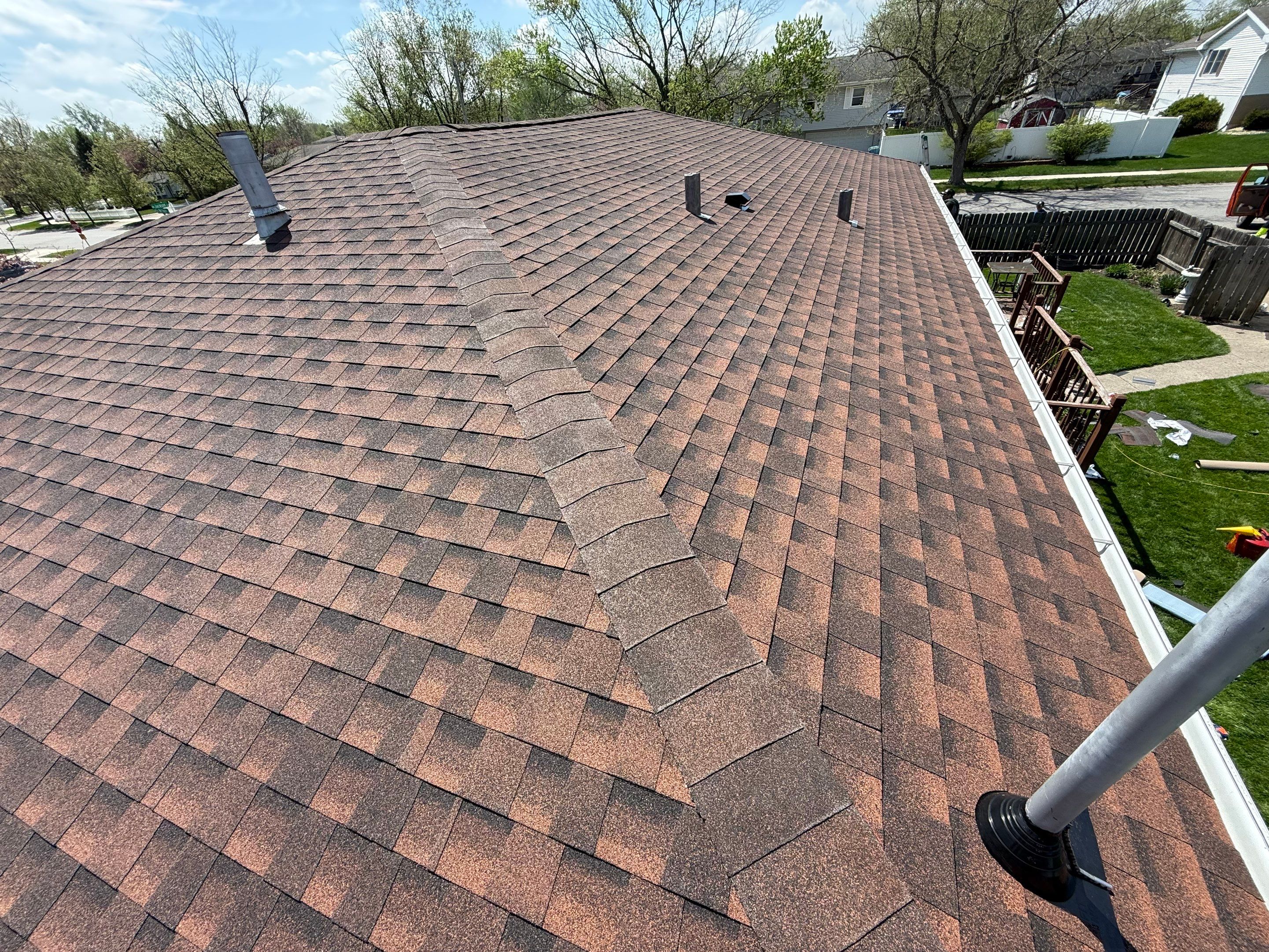 House and garage roof replacement by Optimal Home Improvement 