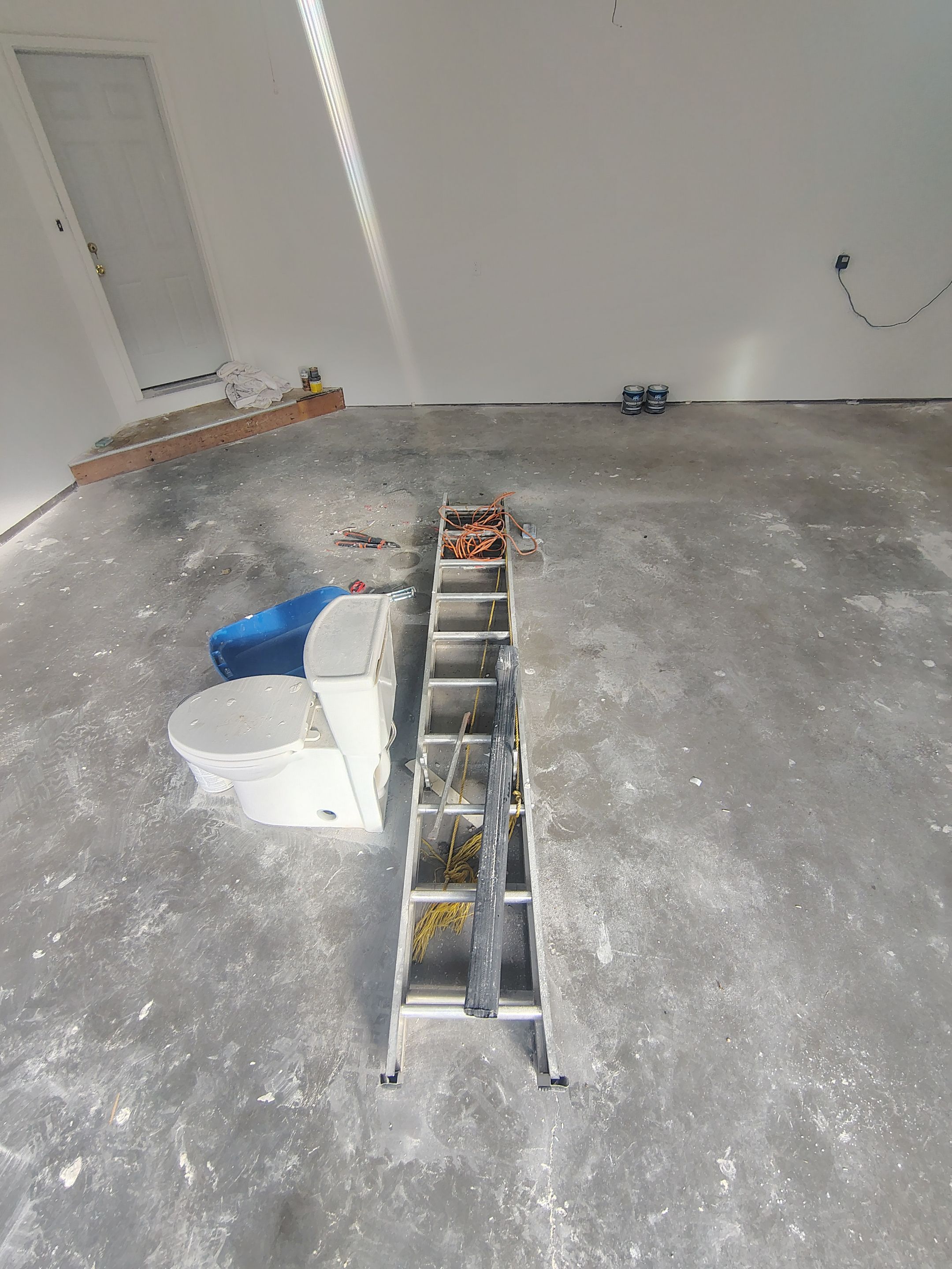 Sioux Falls Garage Floor Coating with Speckled Flake Finish by Select Painting, Coatings & Garage Cabinets