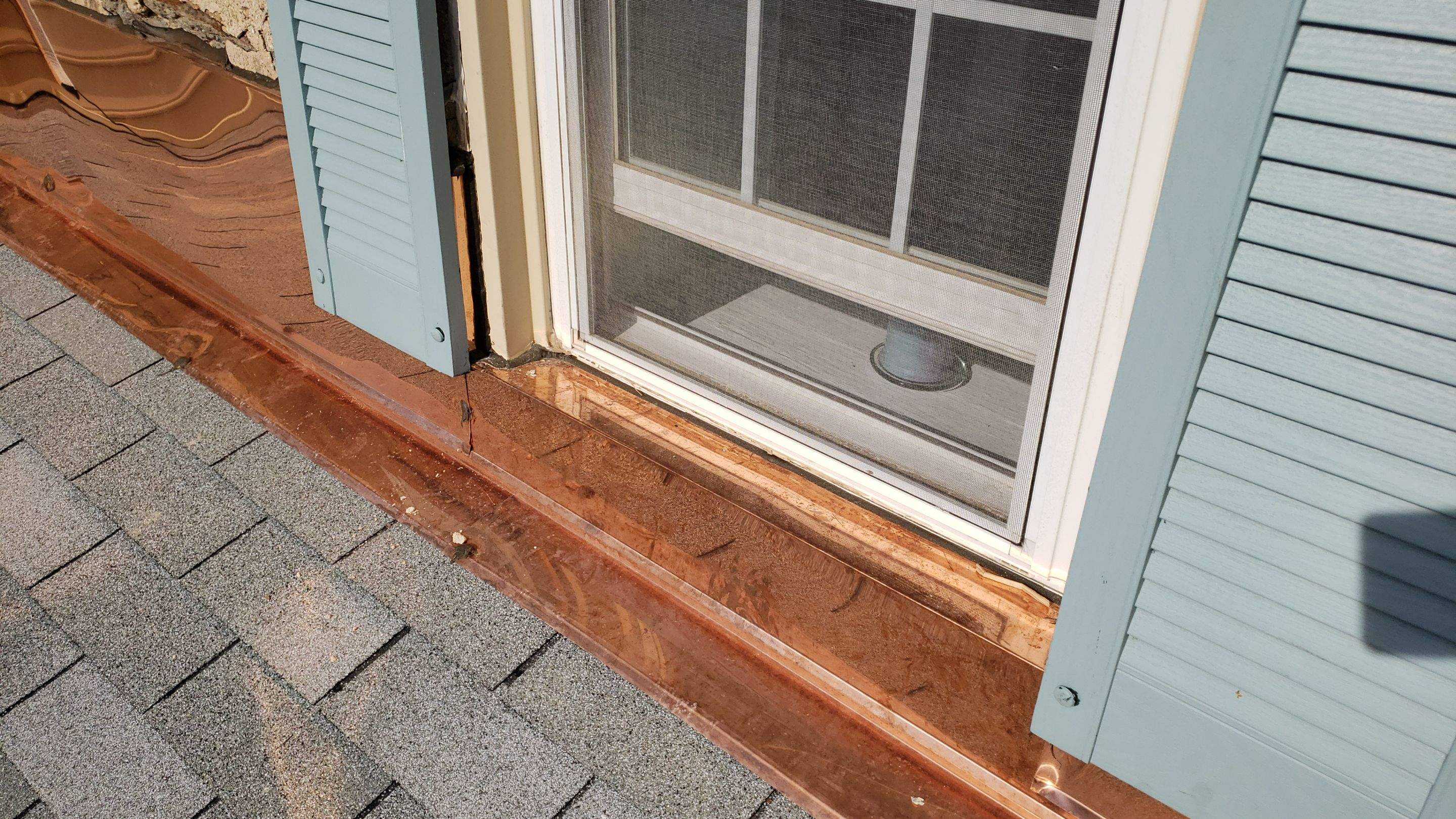 Copper Flashing and Door Installation by Roof Right Inc