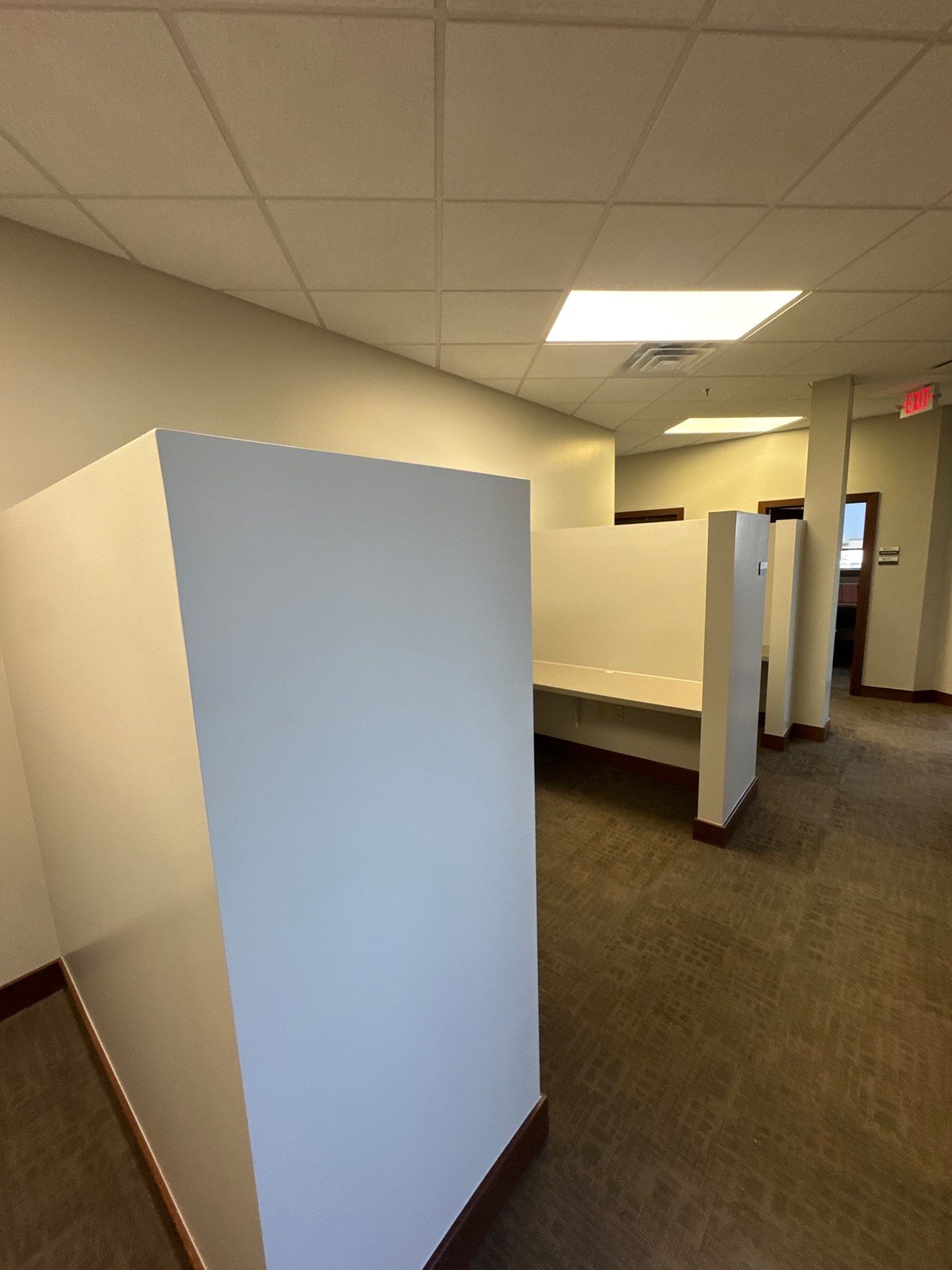 Commercial Office Interior Remodel and Modern Suite Refresh in Sioux Falls by Select Painting, Coatings & Garage Cabinets