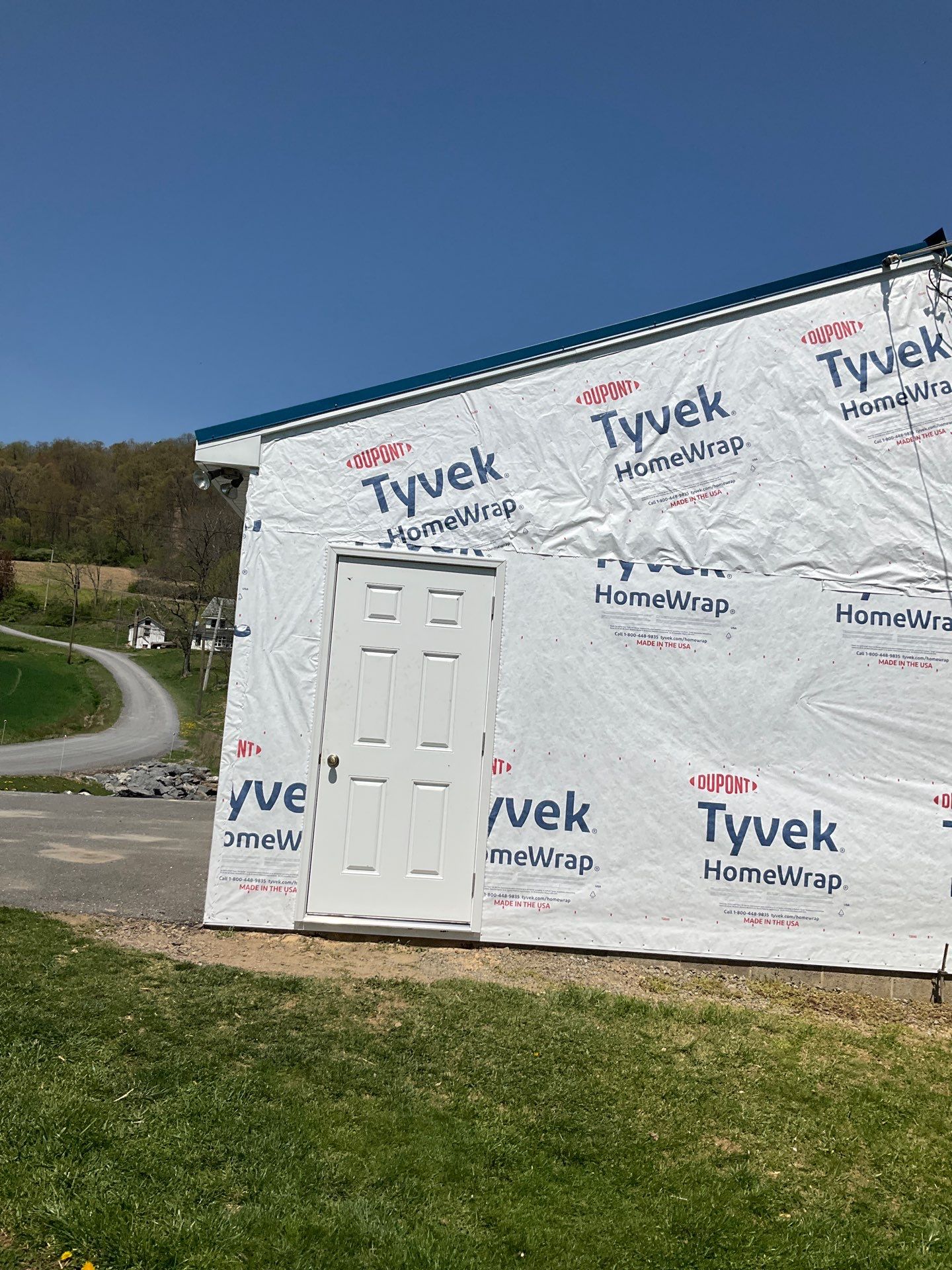 3-Car Garage refresh Blue Metal Roofing in Herndon by Esh Builders