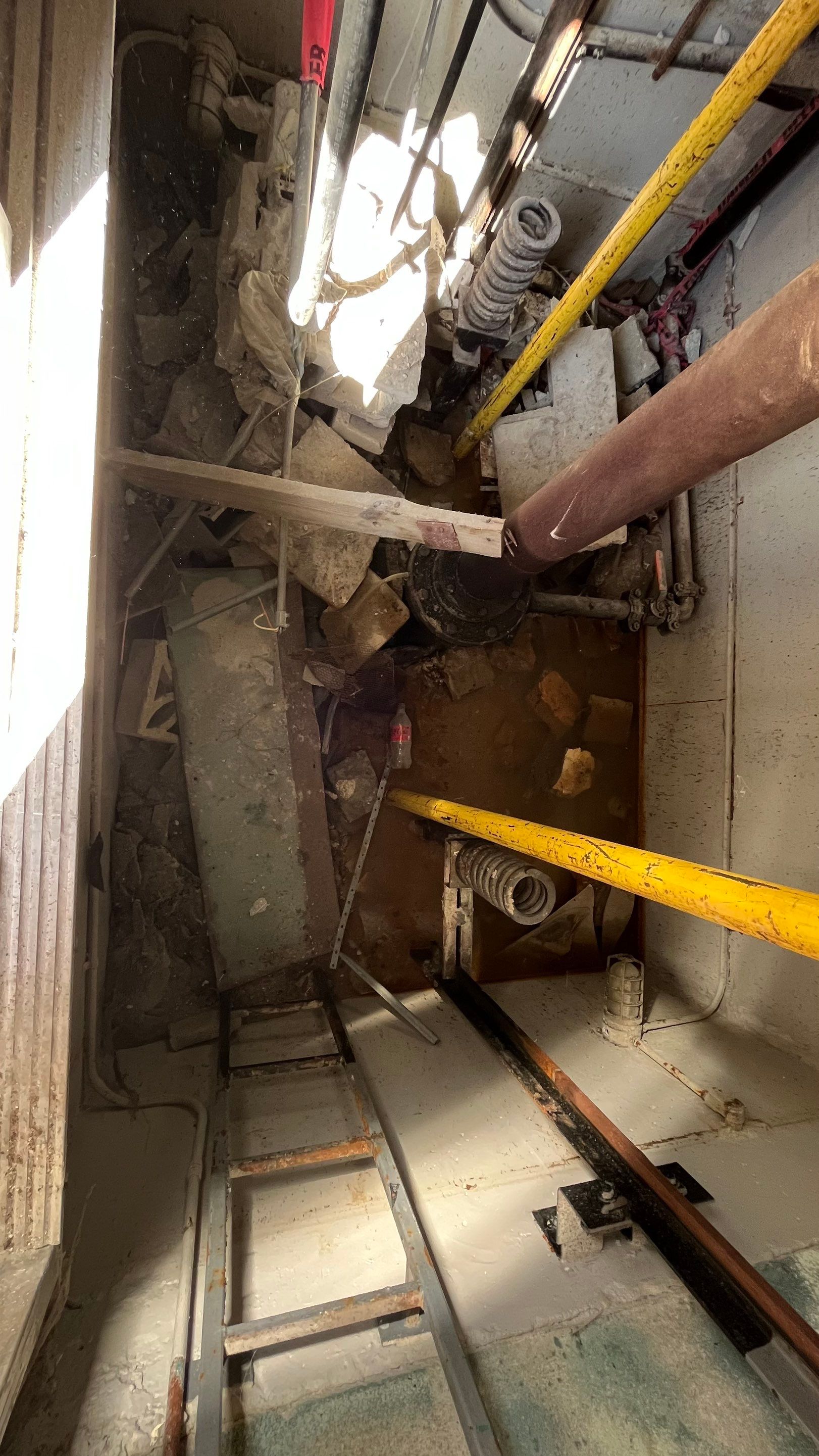 Condo Elevator Shaft Clean Out and Remove Bloackage in Storm Drain System by Don Mar, Inc. Storm Water Solutions