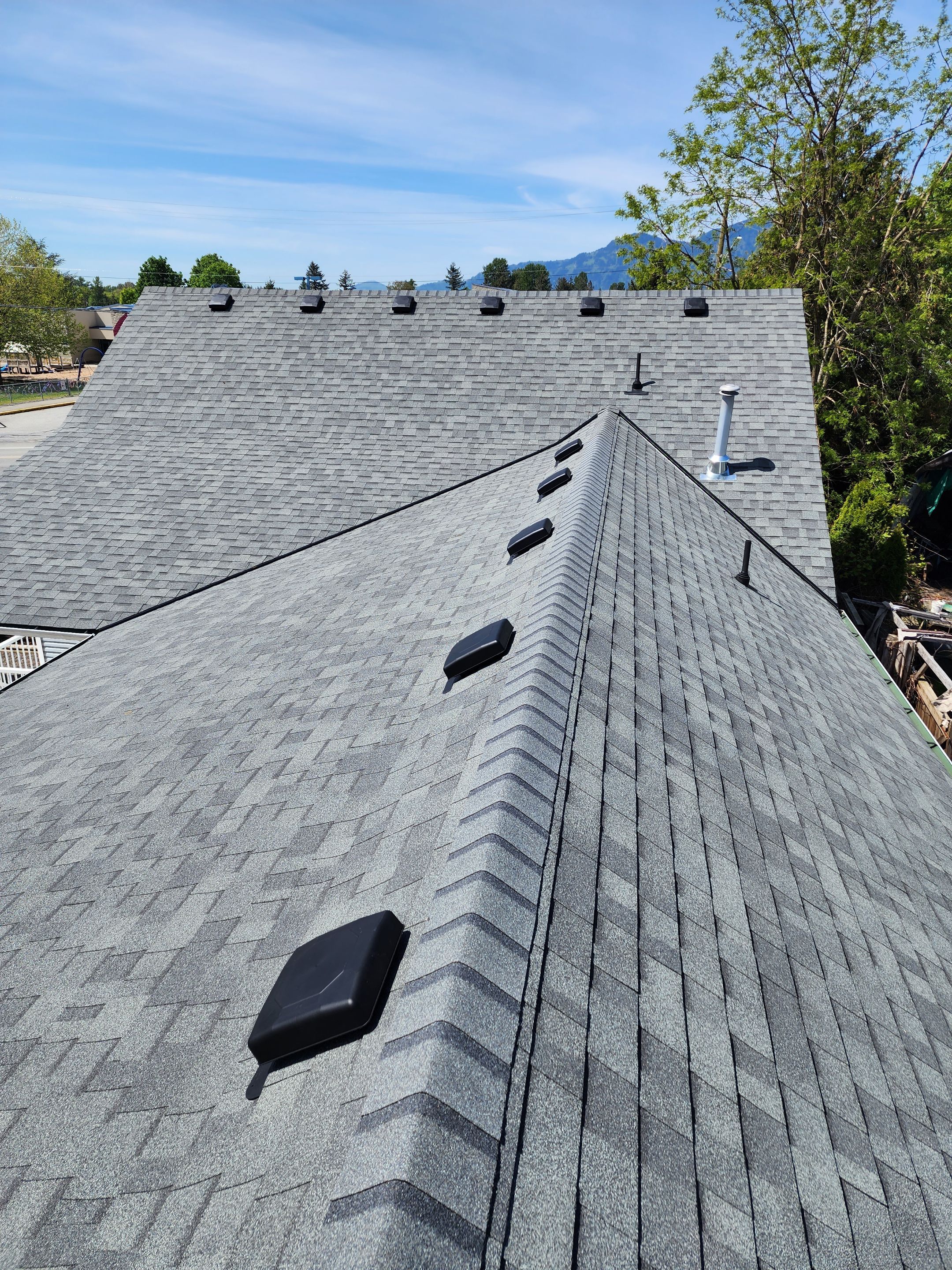 Residential Roofing Installation using Estate Gray Shingles by Top Notch Roofing Inc