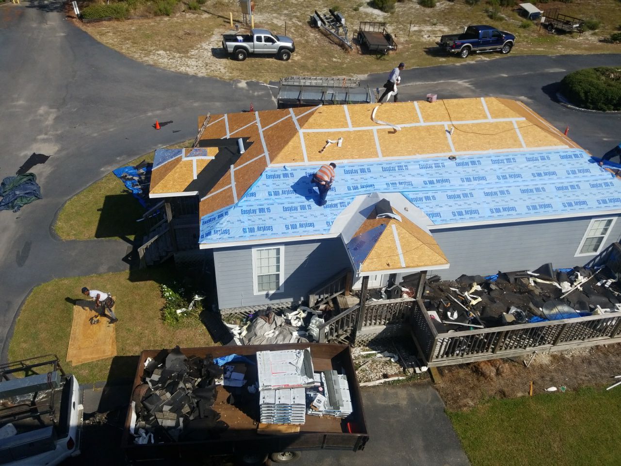 Residential Roofing Installation using Roof Replacement by American Roofing & Construction LLC