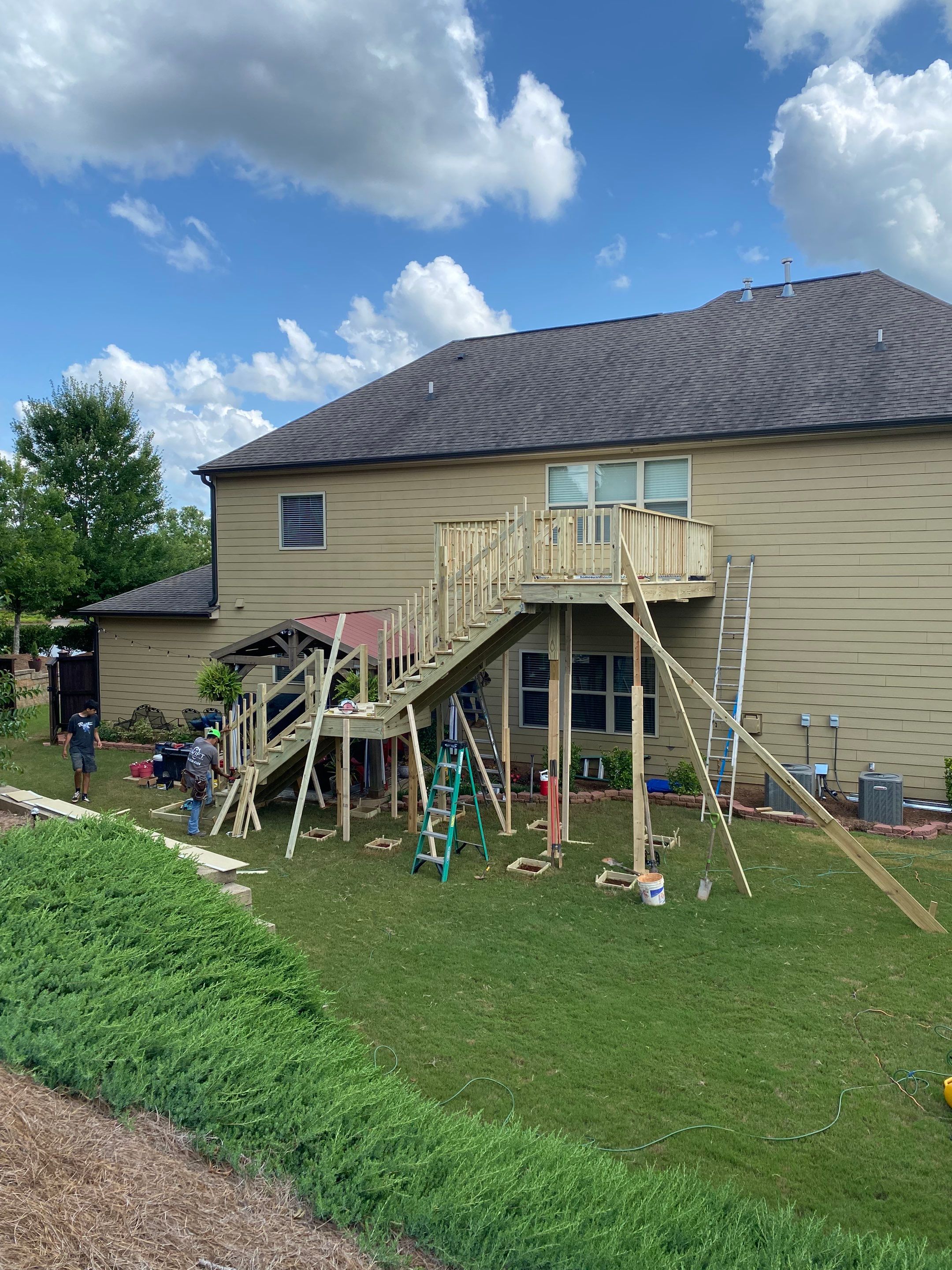 Pressure-Treated Wood Deck and Staircase Construction in Cumming, Georgia by Swift Home Renovations