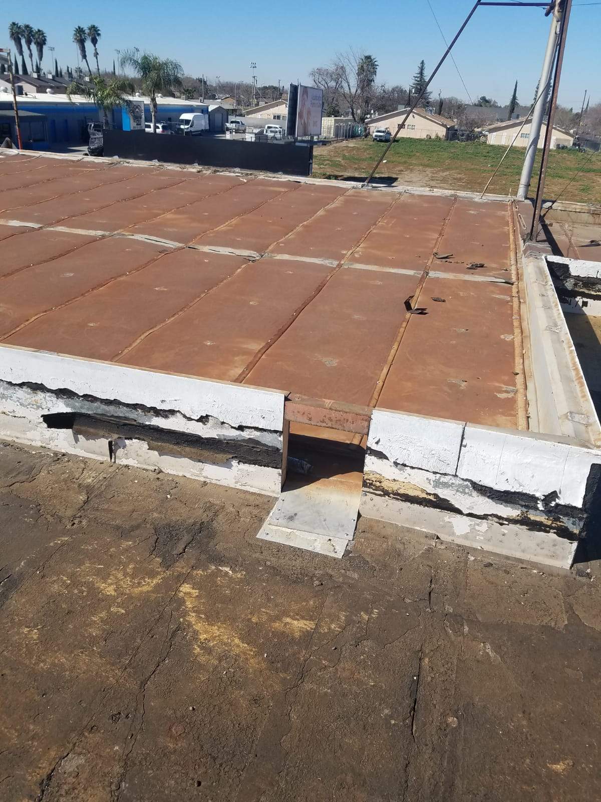 Spray foam and coatings using Conklin Benchmark/PUMA XL coatings and spray foam by Straight Edge Roofing Inc