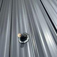 24ga 1.5" Mechanical Seam Matte Black by Total Roofing System The Metal Roof Experts