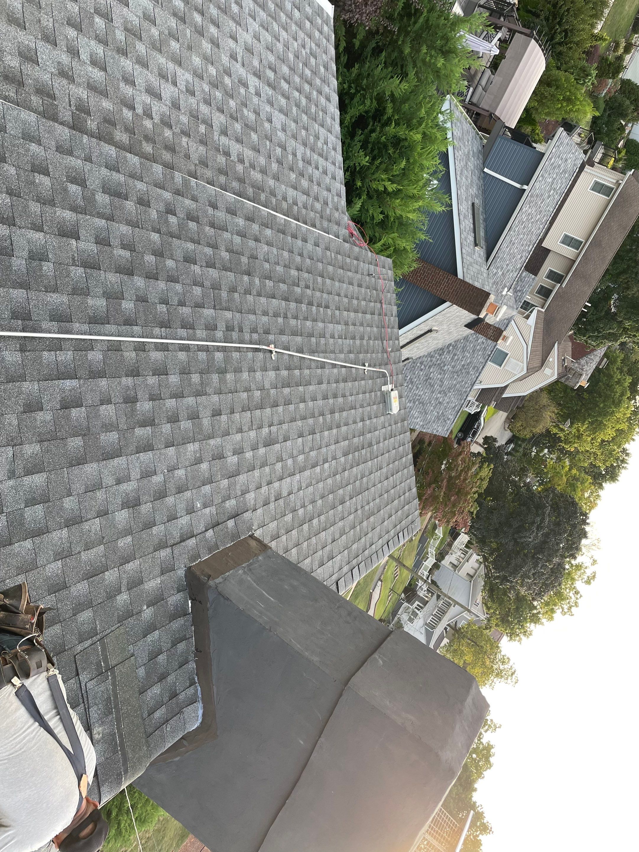 Estate Gray Shingles by Reimagine Roofing