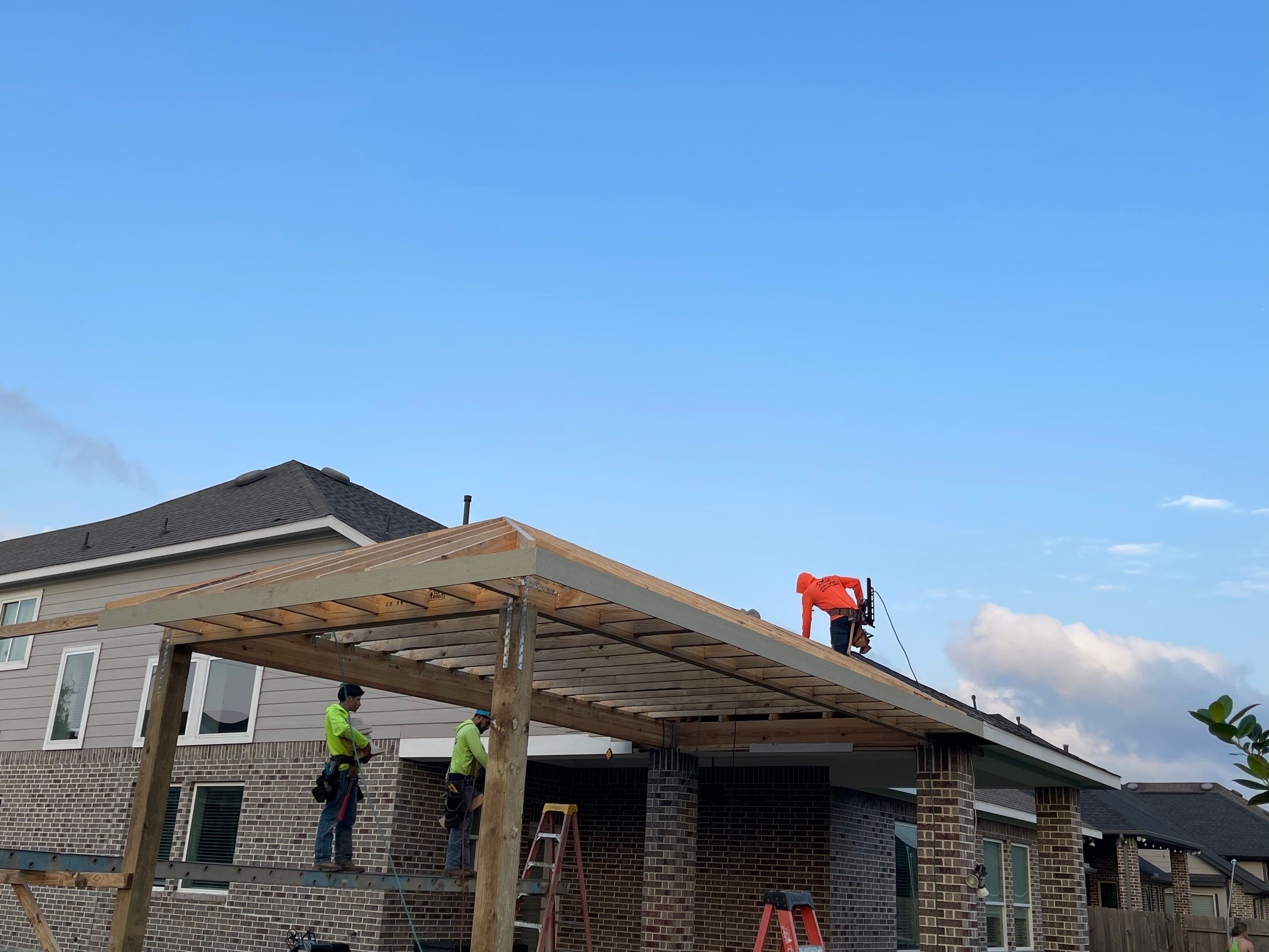 Covered patio and Summer Kitchen in Spring, TX by SophAlx LLC
