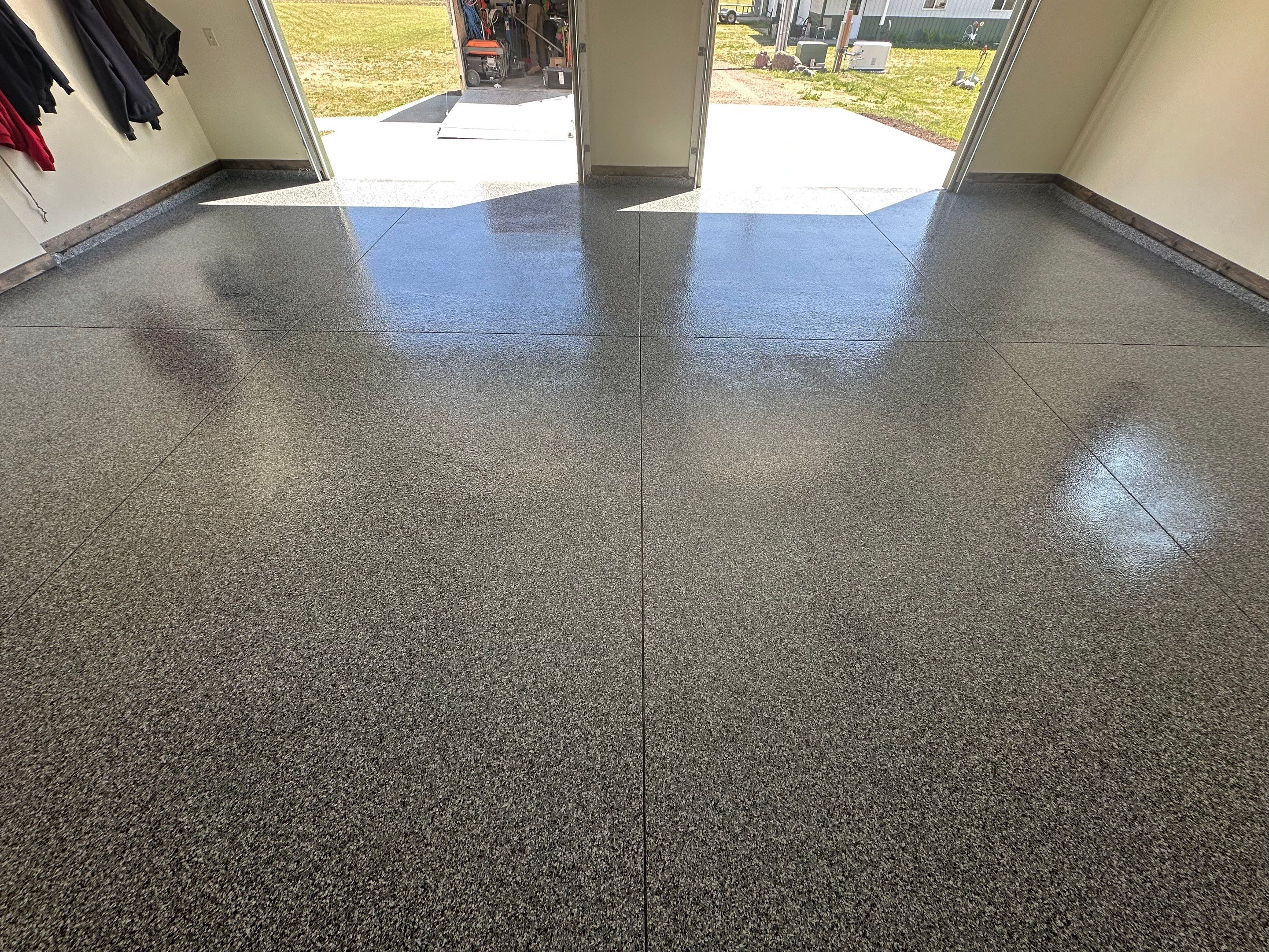 Speckled Epoxy Garage Floor Coating and Concrete Repair in Lennox by Select Painting, Coatings & Garage Cabinets