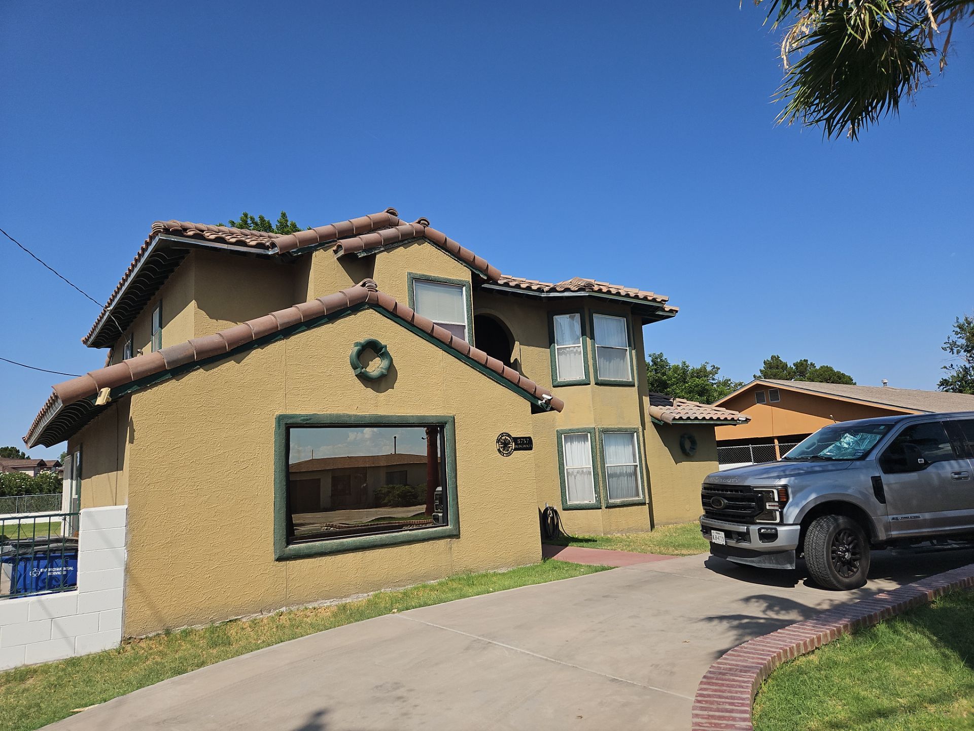 Exterior Stucco Painting and Repair by Regal Renovate