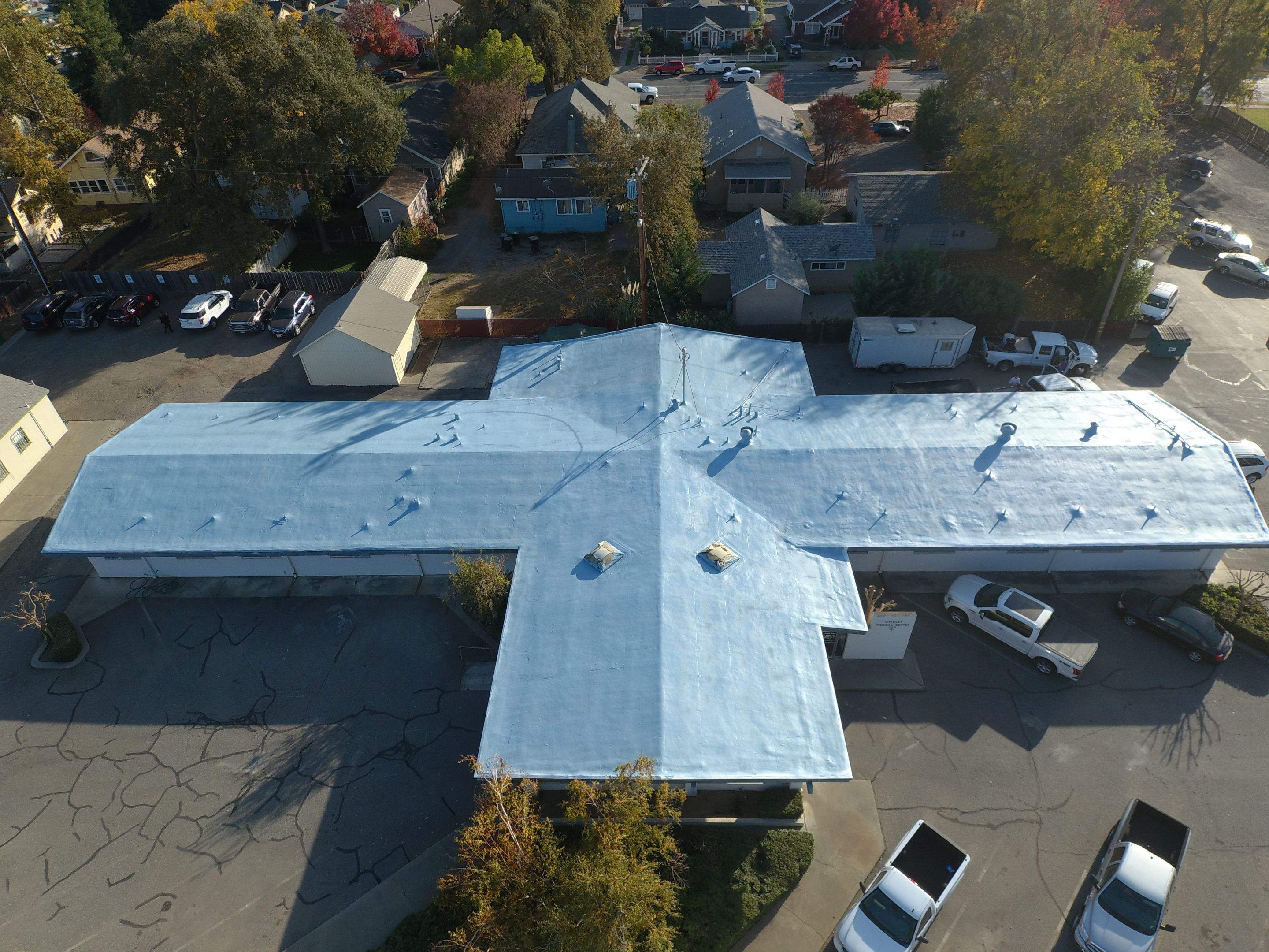 Spray foam and coatings using Conklin Benchmark/PUMA XL coatings and spray foam by Straight Edge Roofing Inc