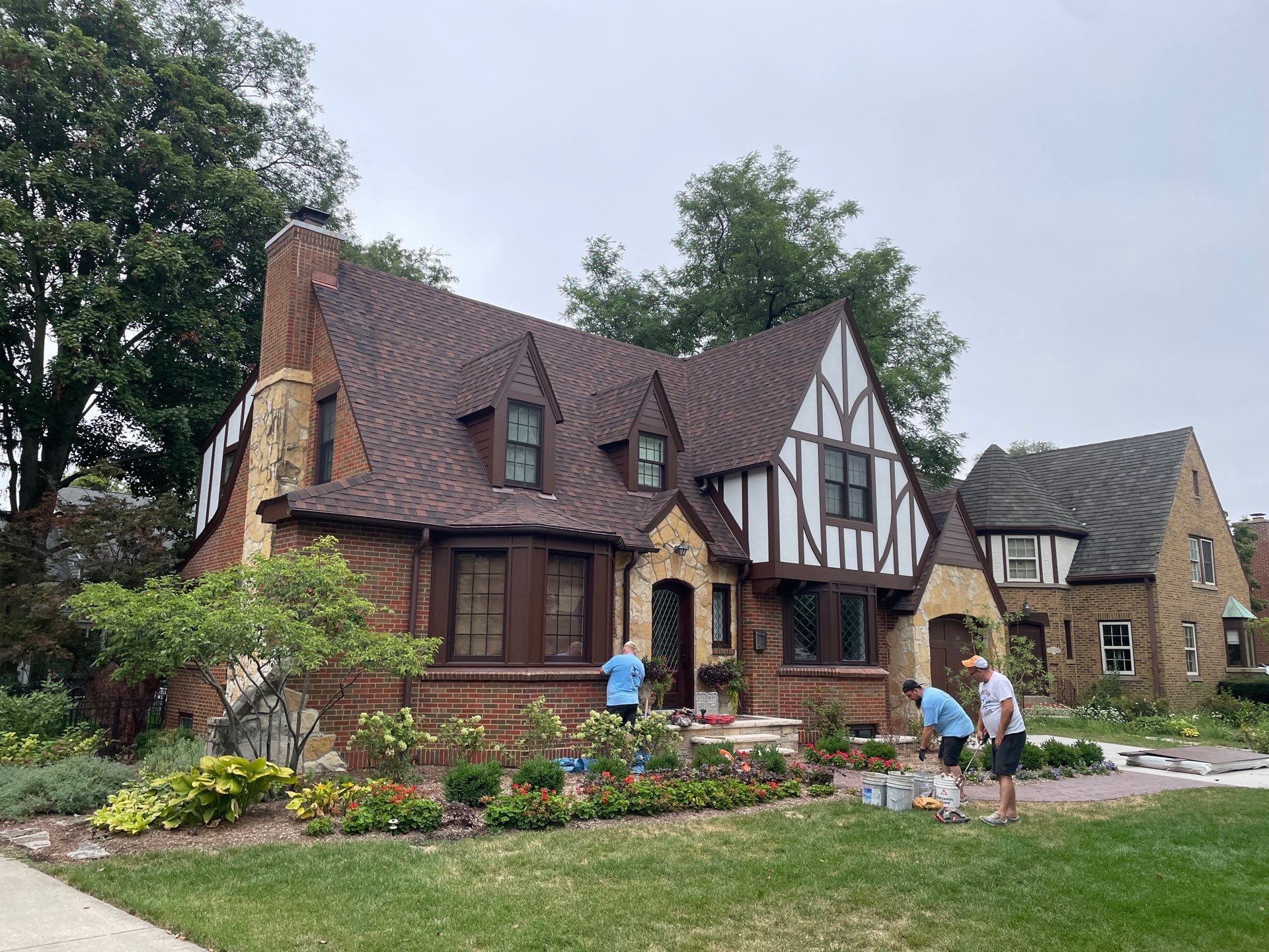 Tudor-Style Hardie Exterior Renovation in Elmhurst by Great American Exteriors