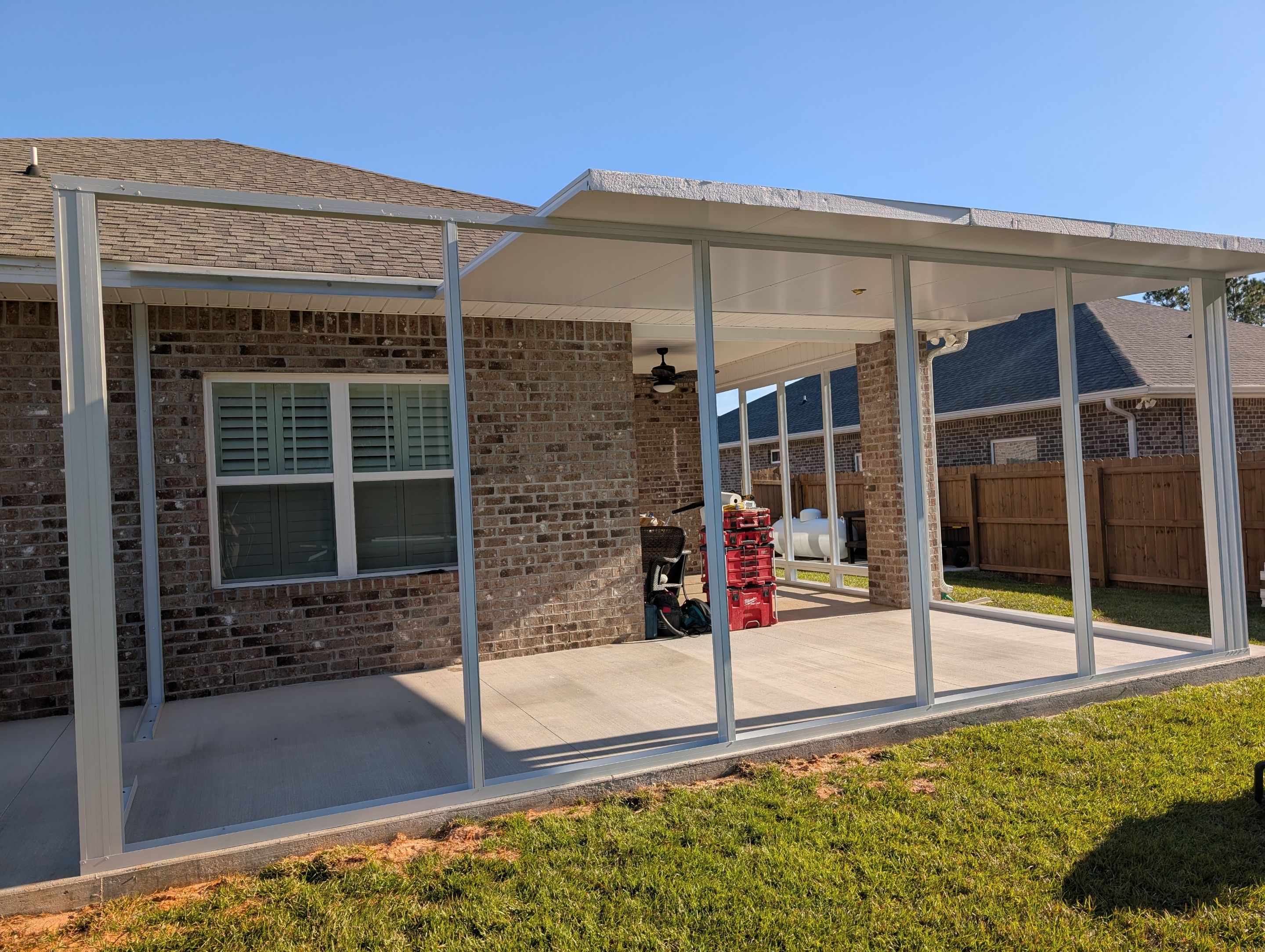 Home addition w/Vinyl 4-Track Windows by Titan Sunrooms