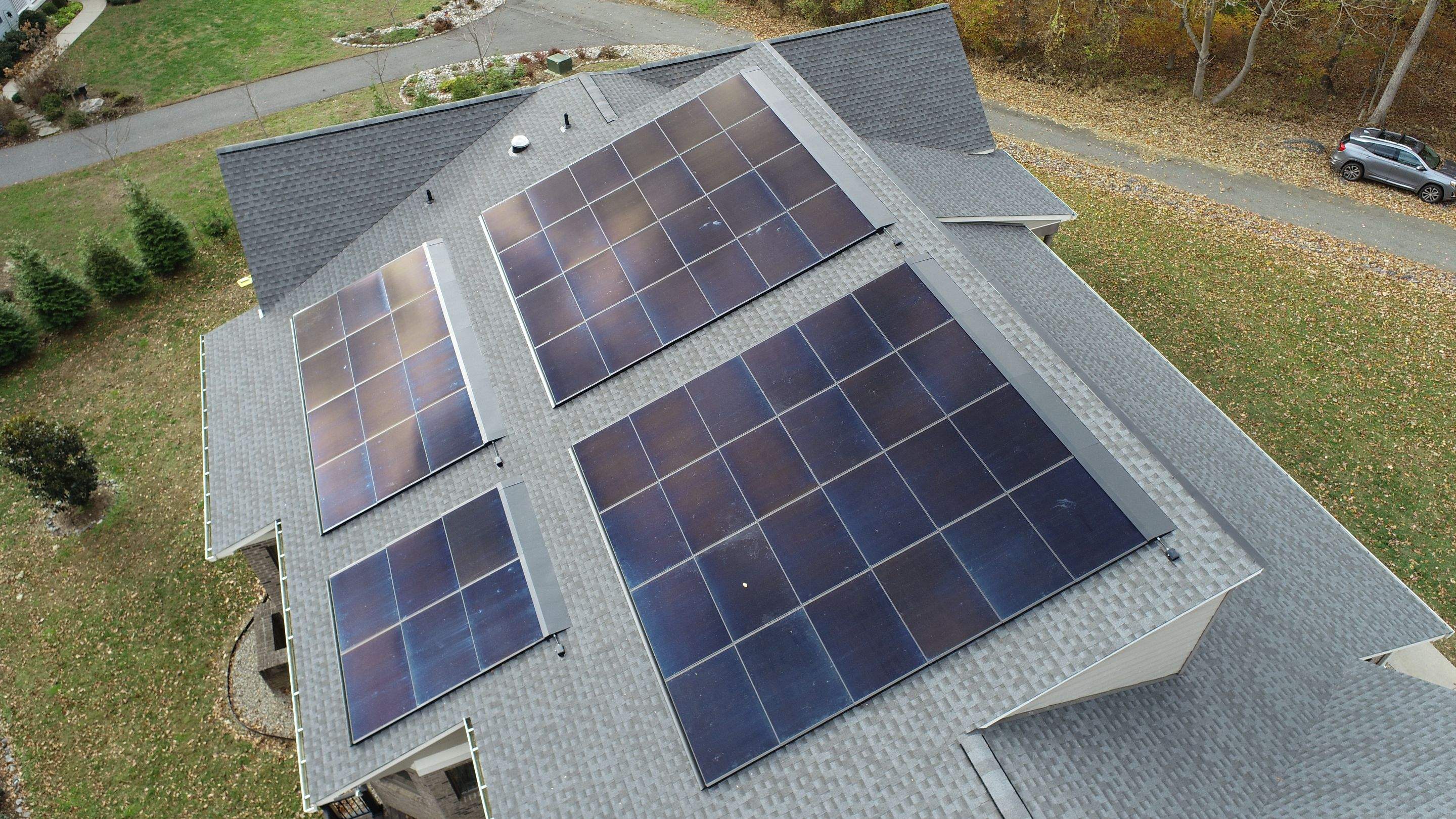 Solar Roof using GAF Decotech integrated panels by American Home Contractors