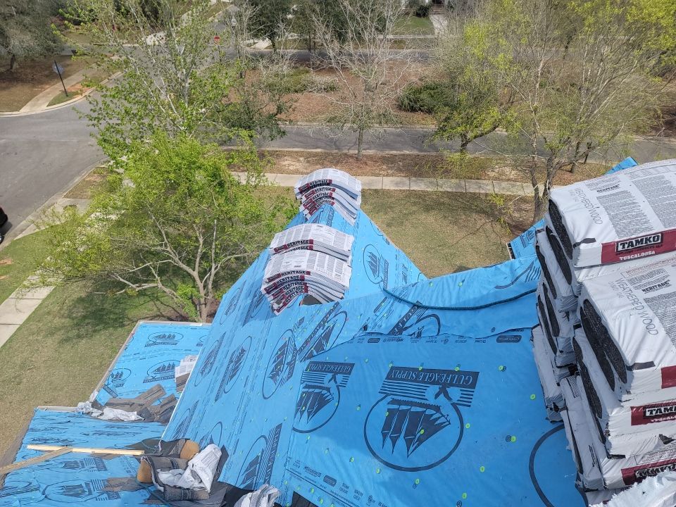 Residential Roofing Installation using Roof Replacement by American Roofing & Construction LLC