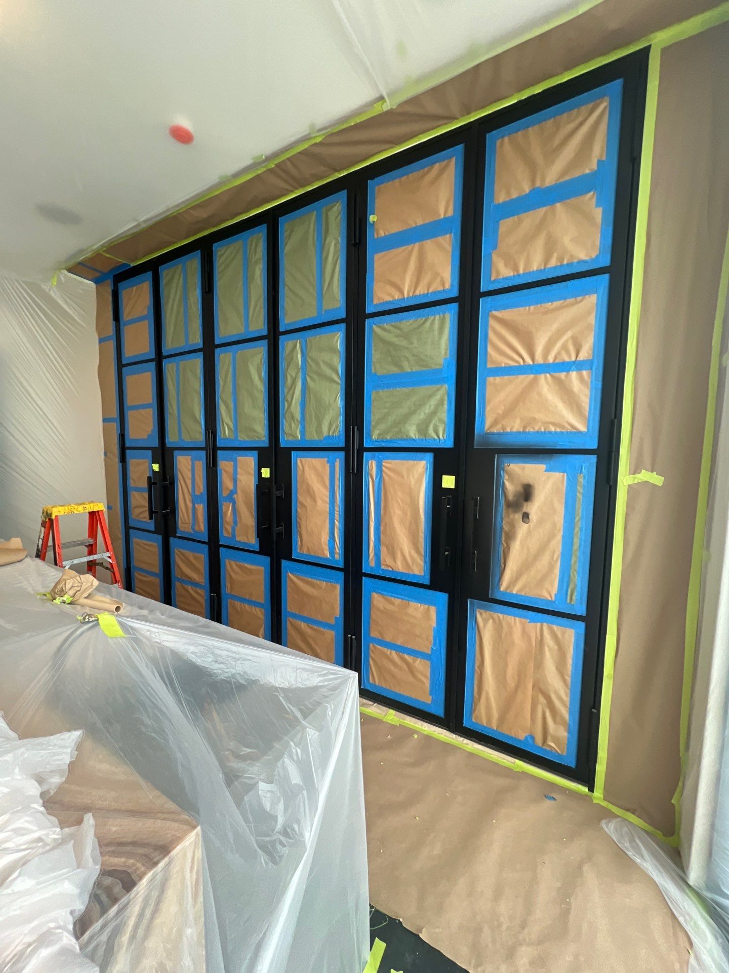 Custom Black-Framed Glass Wine Cellar Installation in Dallas by Solara Custom Living