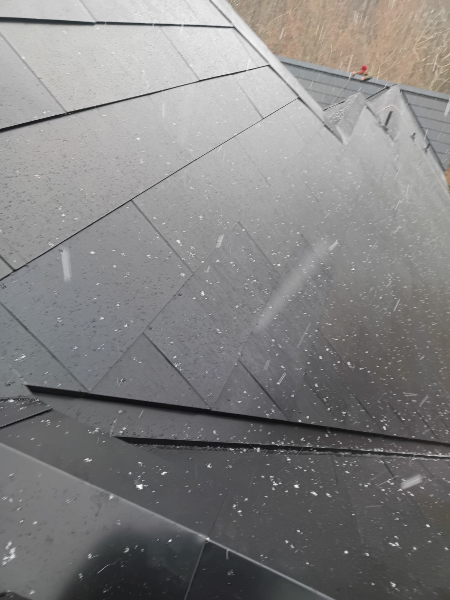 Tesla Solar Roof Replacement  by American Home Contractors