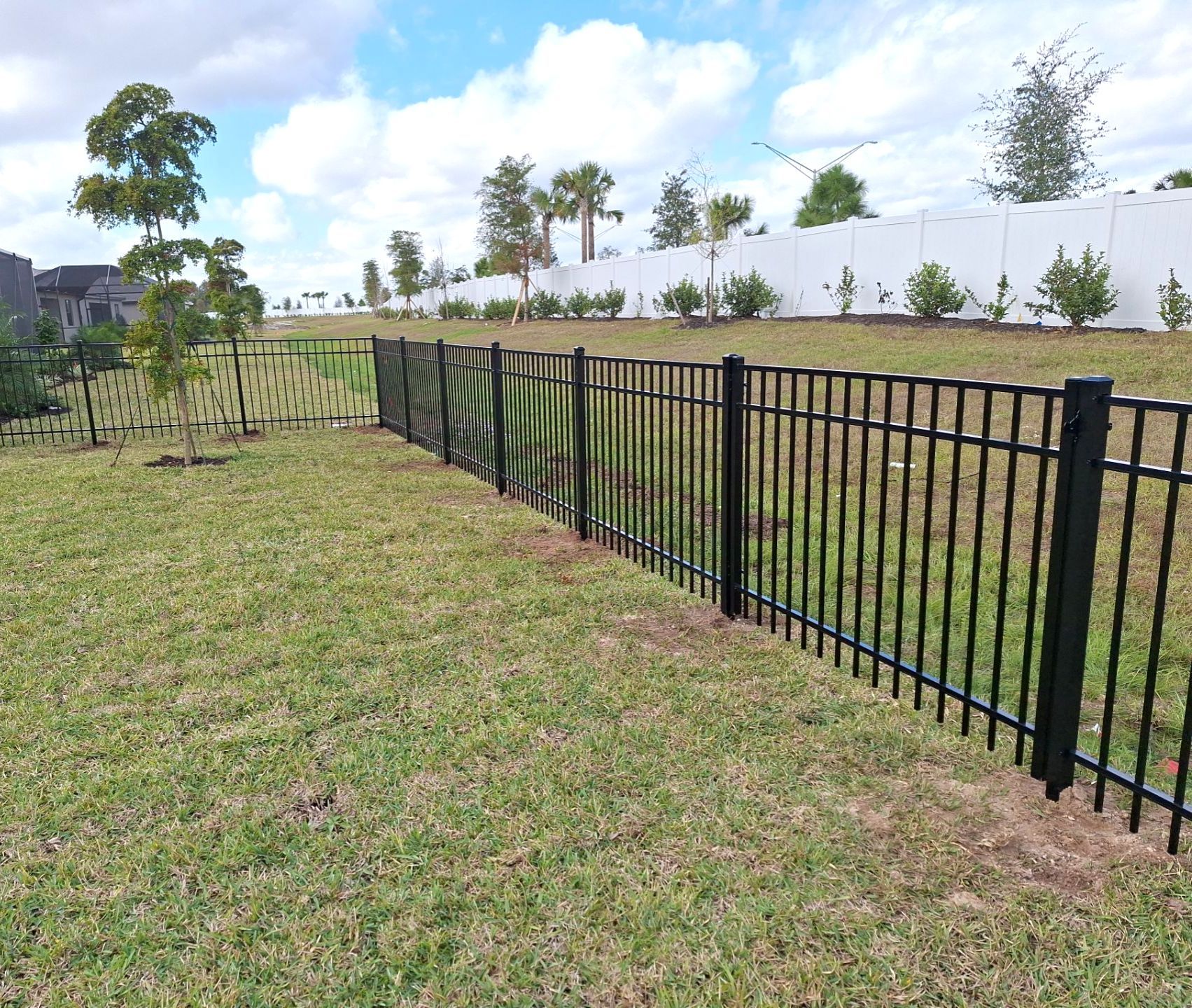 Aluminum Fence Installation using 4ft 3 Rail Black Aluminum Fence by Asap fence and gates, LLC