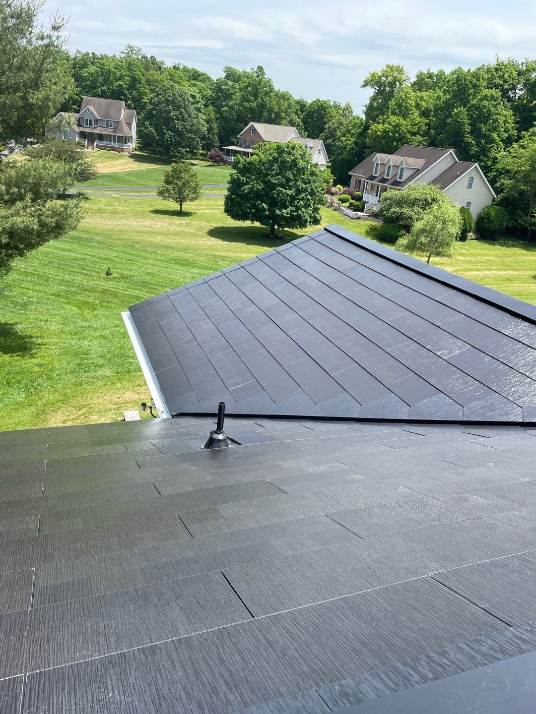 Tesla Solar Roof Installation by American Home Contractors