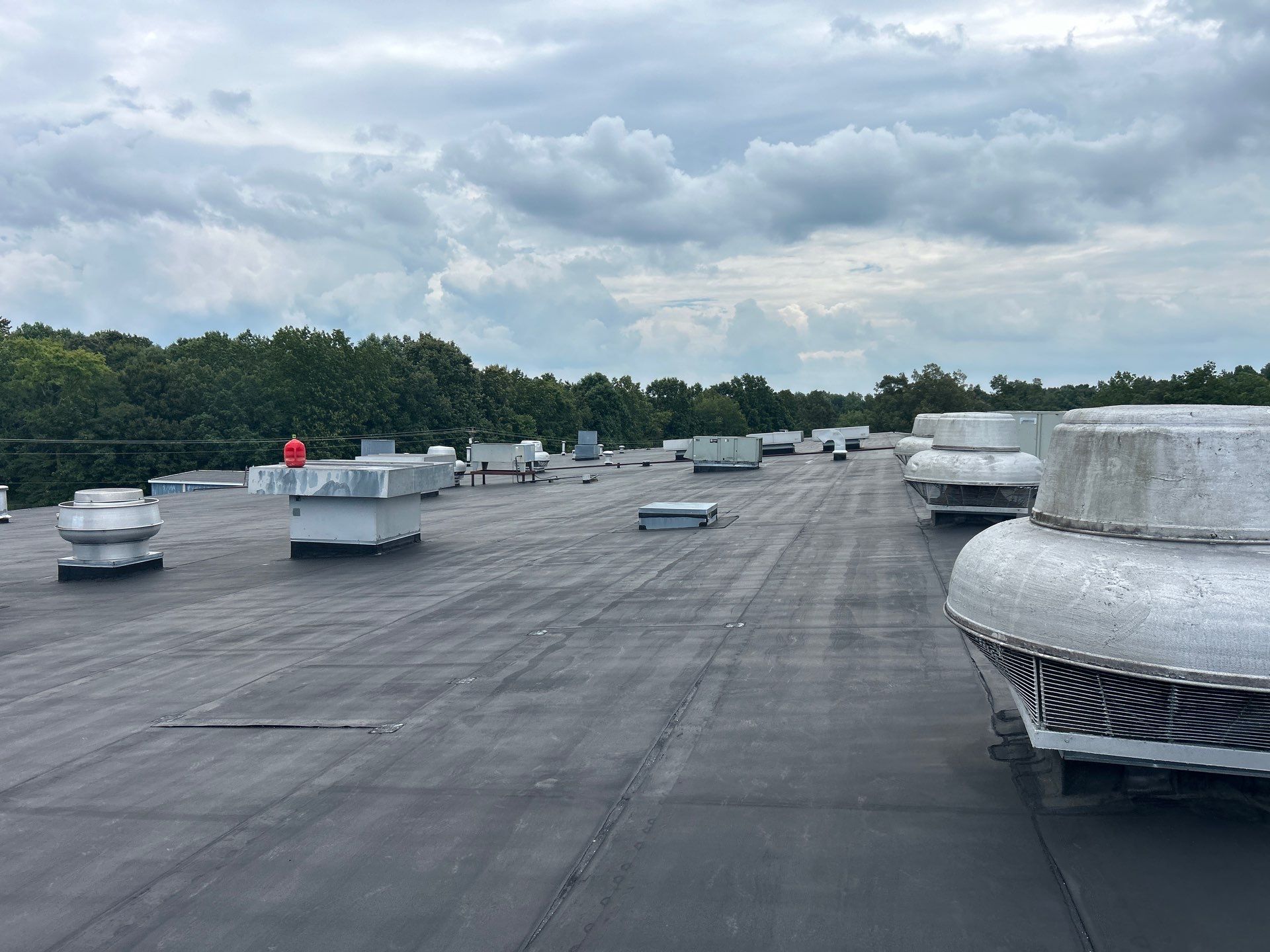 Commercial Roofing Installation using Coatings by Kentucky Commercial Roofing