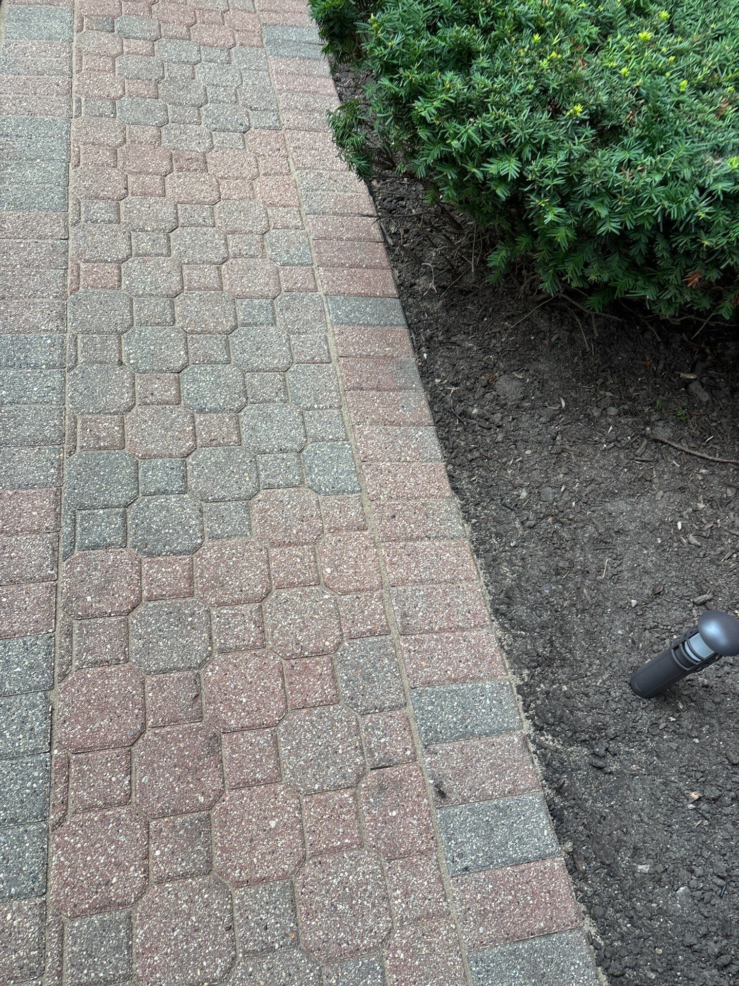 Brick paver repair, clean and seal by Northern Power Washing LLC.