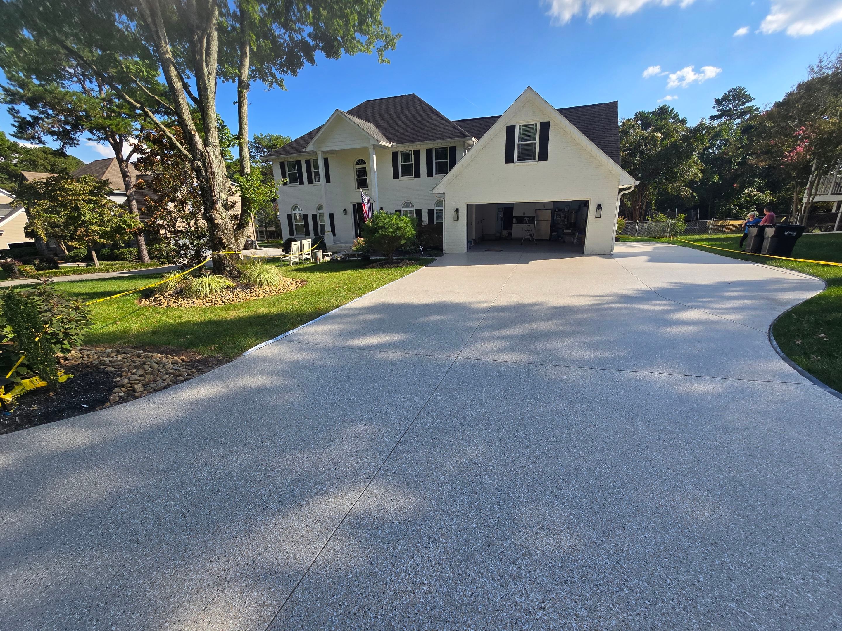 Driveway, Sidewalk, and Porch Using Claystone by Elite Floor Solutions