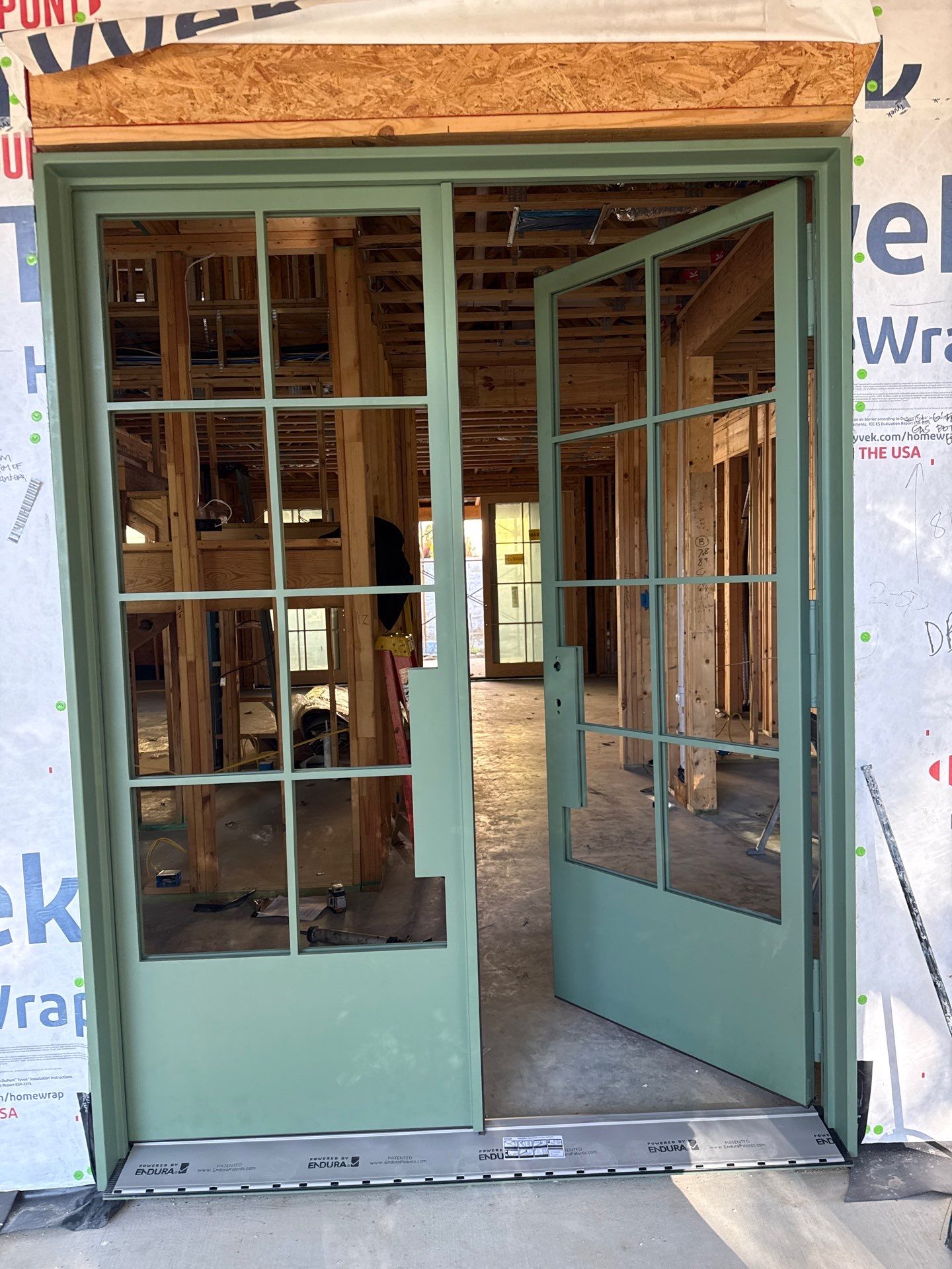 Steel Double Door Installation in Fort Worth in Sage Green by Solara Custom Living