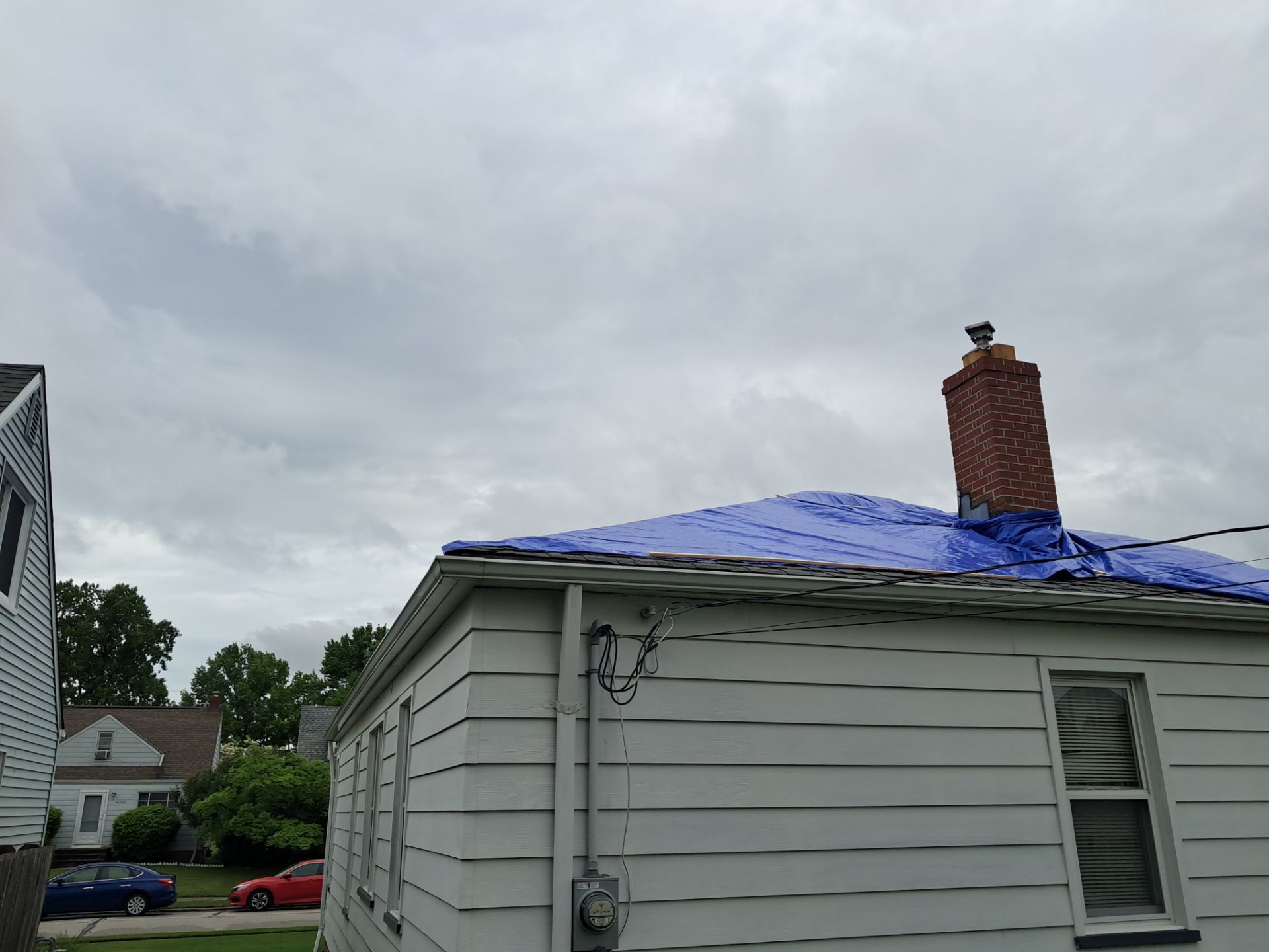 EMERGENCY TARPING ROOF BEFORE STORM using TARP by Absolute Roofing and Construction