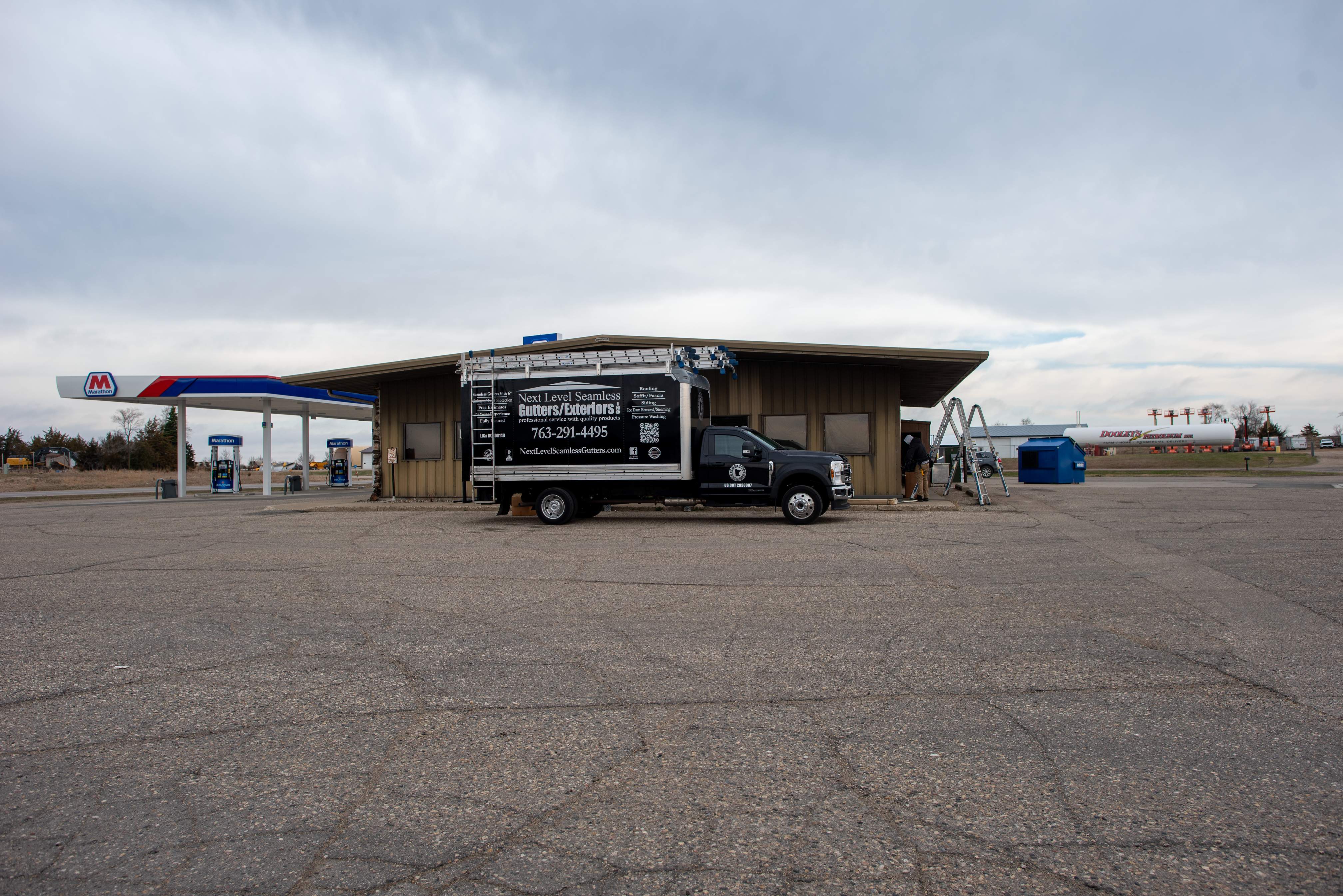 Commercial Gutter Repair in New London MN | Reseaming Gutters & New Downspouts by Next Level Seamless Gutters / Exteriors Inc.
