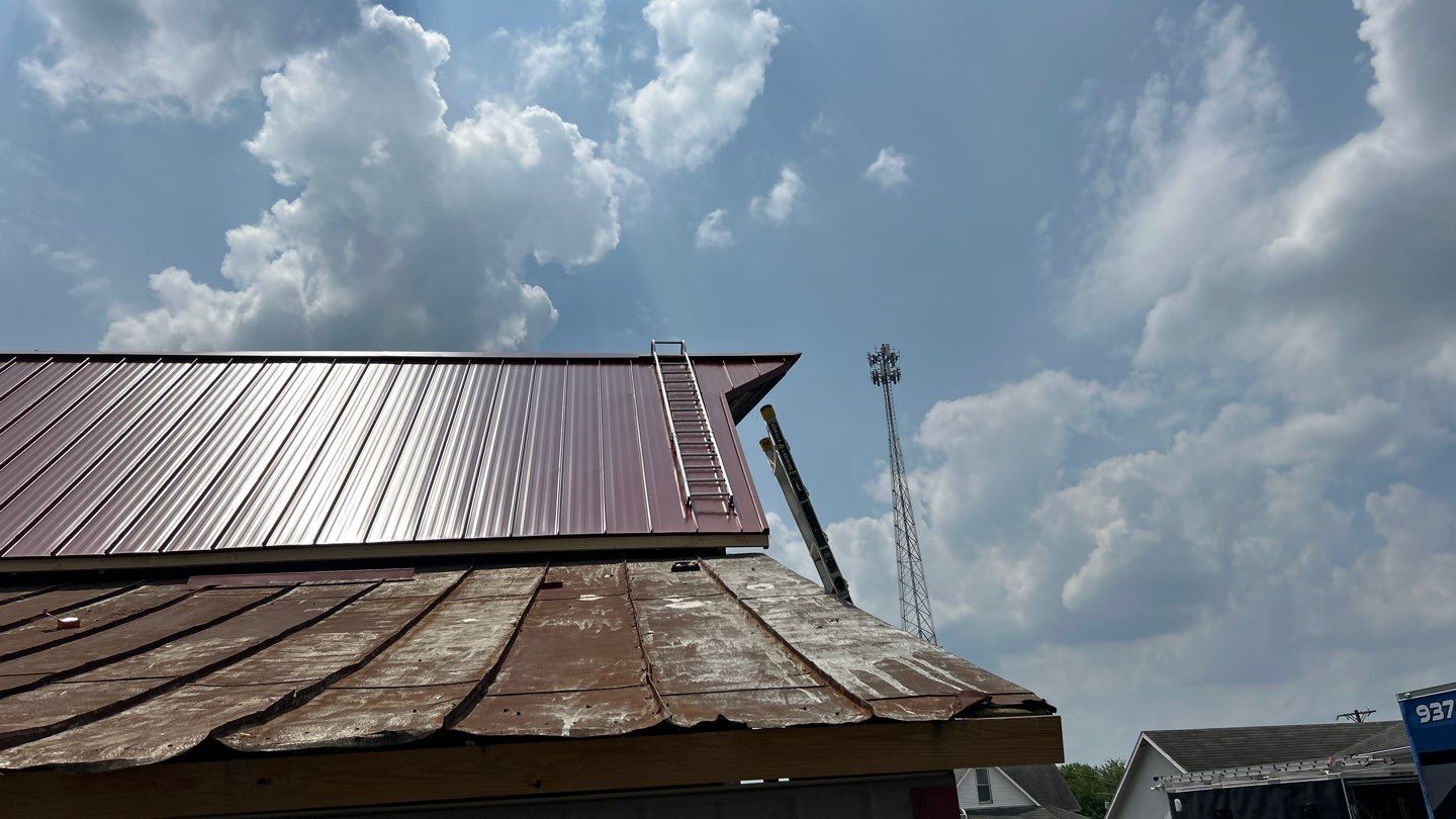 Residential Roofing Installation using Standing Seam Metal - Barn Red by RoofX 
