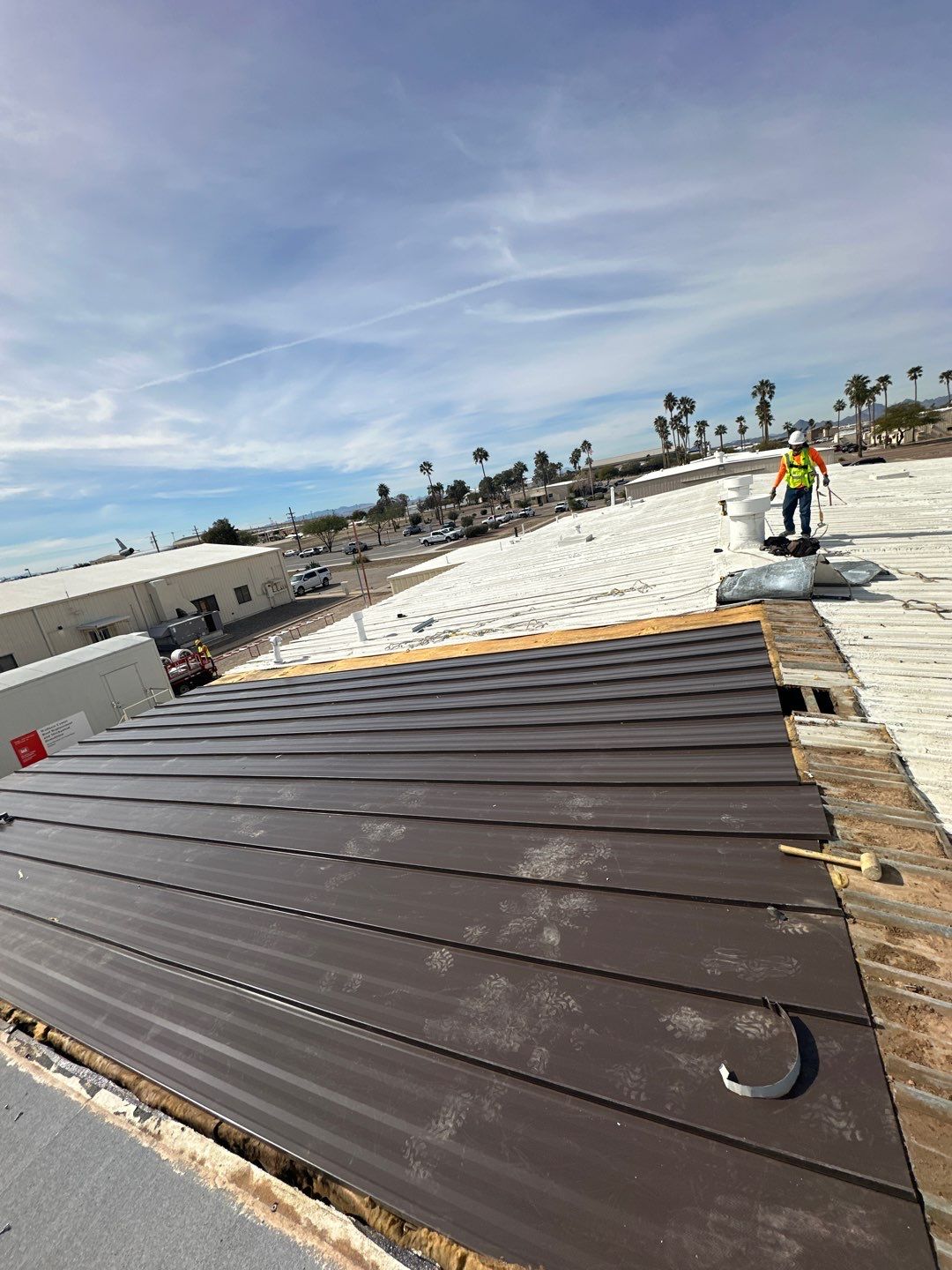 Burnished Exposed Fastener by Reimagine Roofing