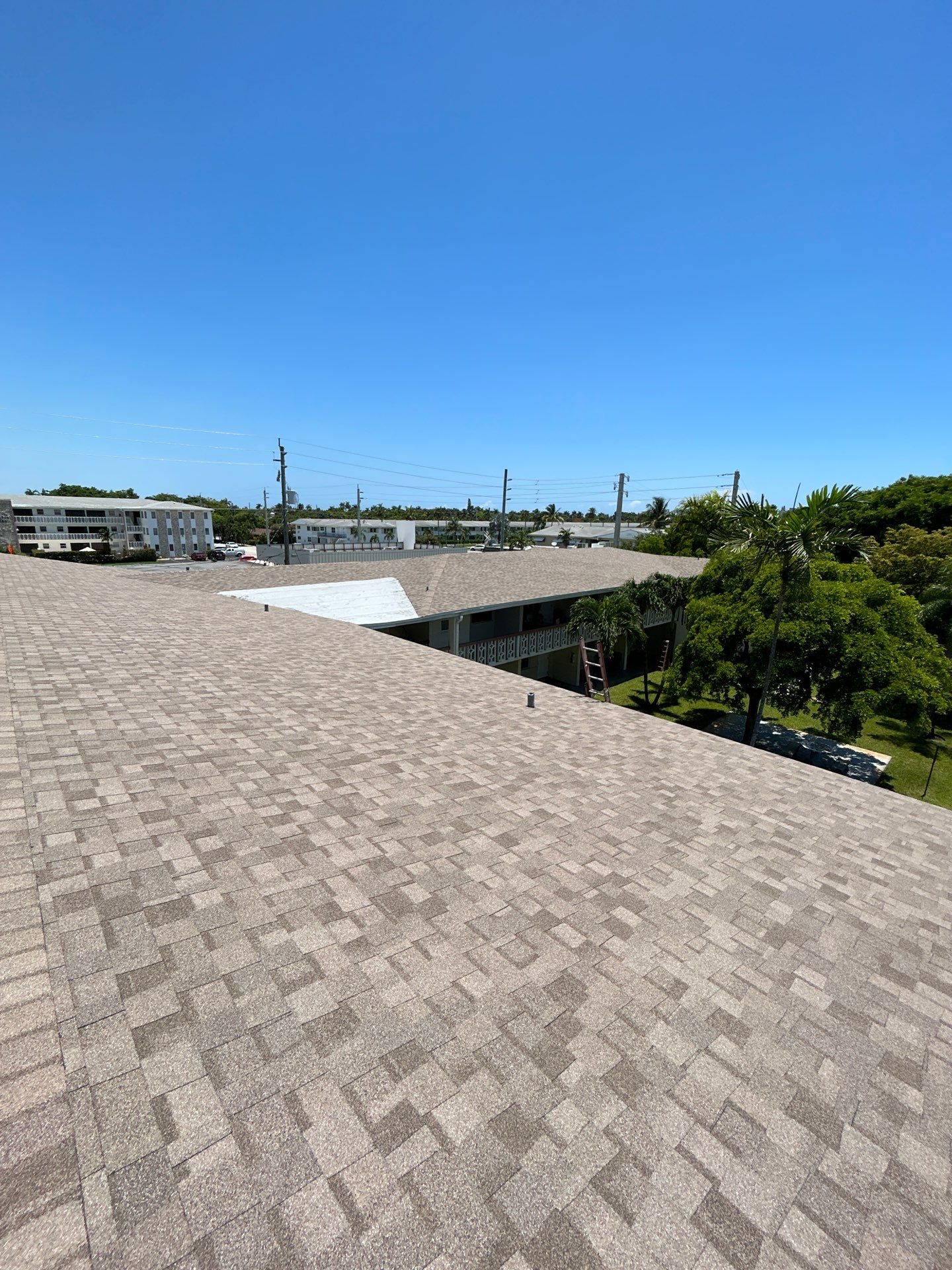Commercial Roofing Installation using CERTAINTEED LANDMARK AR (SUNRISE CEDAR) by Earl W. Johnston Roofing 