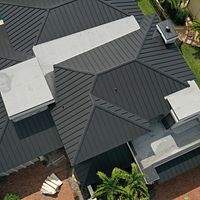 24ga 1.5" Mechanical Seam Matte Black by Total Roofing System The Metal Roof Experts