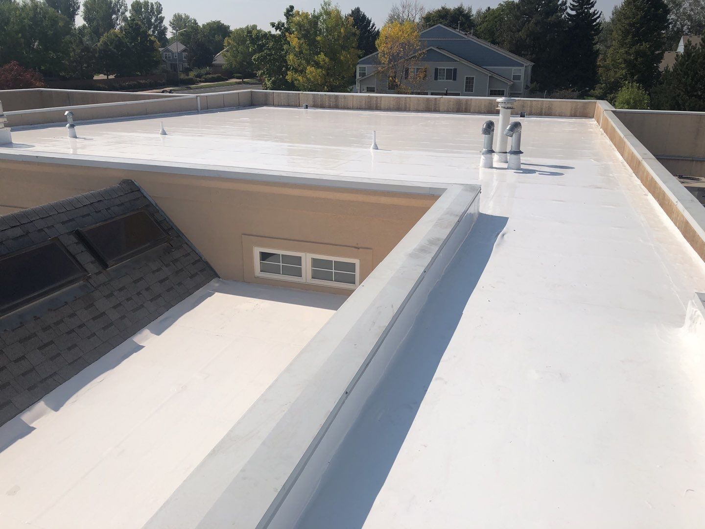 Commercial Roofing Installation using American Standard Coating - S  by A to Z Roofing