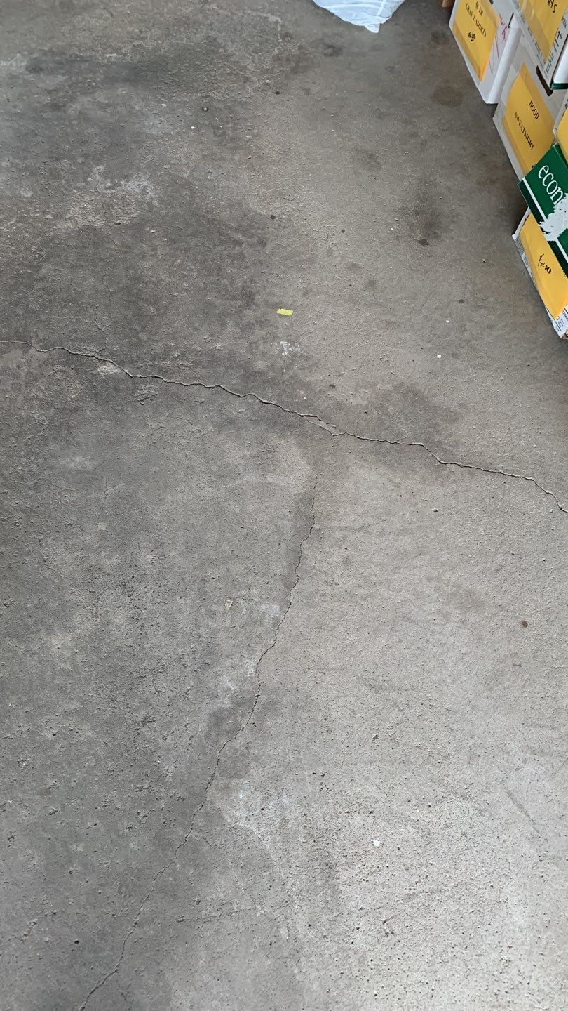 West Des Moines Garage and Patio Floor Coating using Pebble Beach Flakes by Revival Concrete Coatings