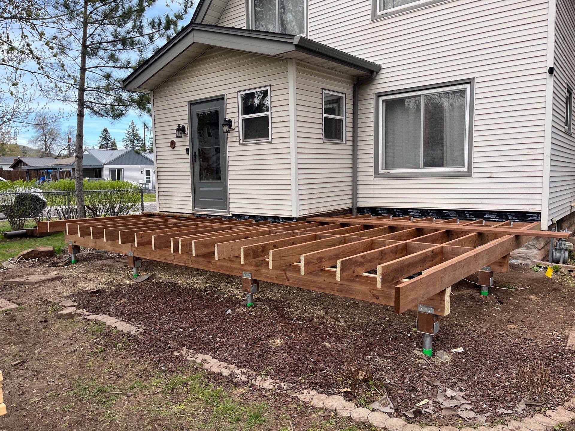 Brown Treated Deck by Anchor North Property Services
