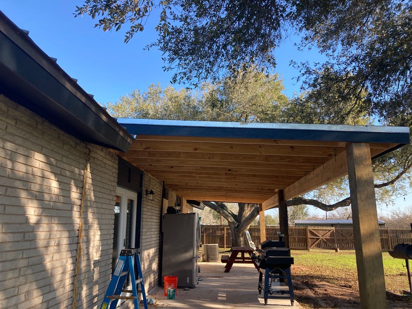 Beeville Backporch sittin' by Bayfront Roofing and Construction