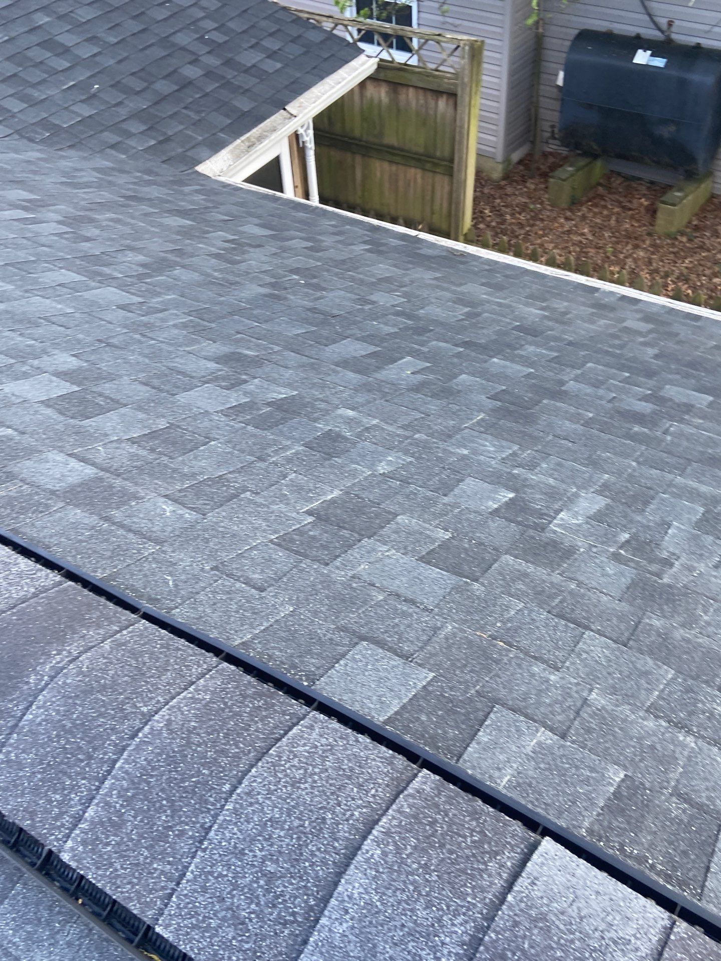 Skylight Installation and Residential Roof Installation using TAMKO TITAN - Rustic Black by Storm Ready Exteriors