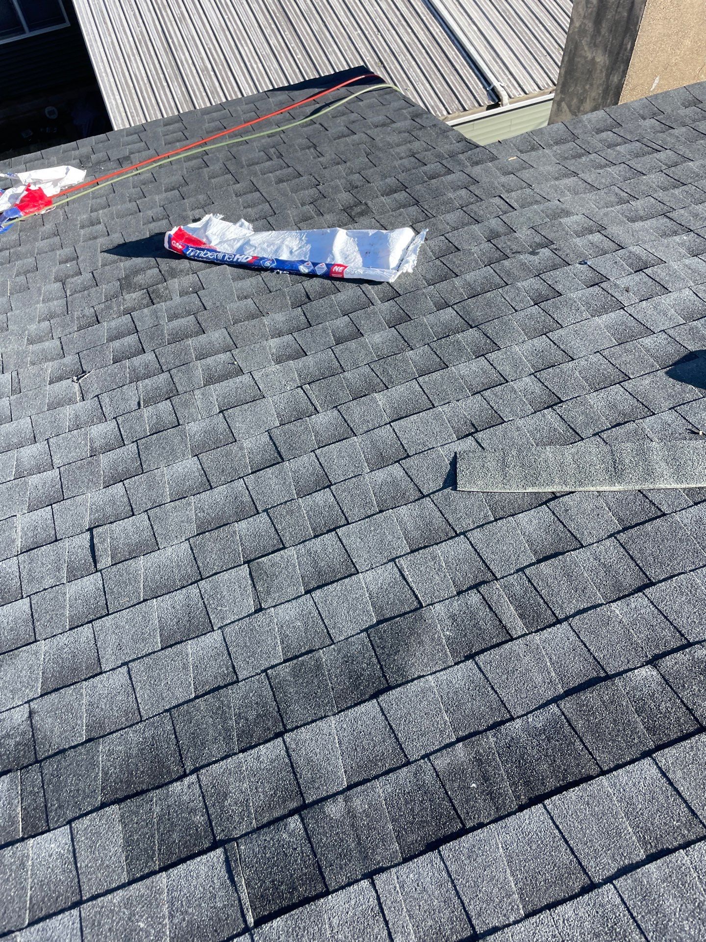 Residential Roofing Installation using GAF Timberline HDZ Charcoal by Rainstoppers Roofing