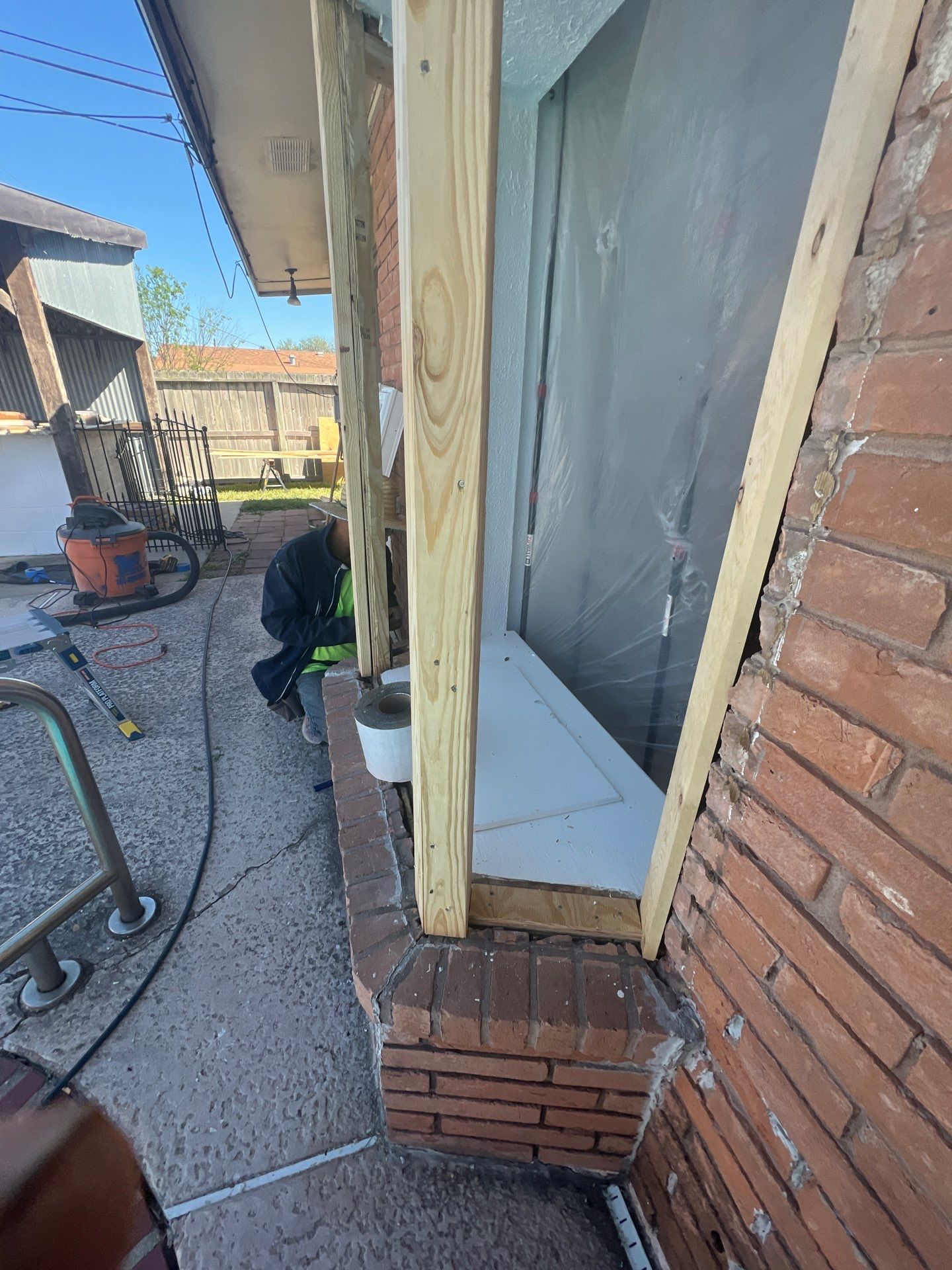 Windows in Brick with a Bay Window by Bayfront Roofing and Construction