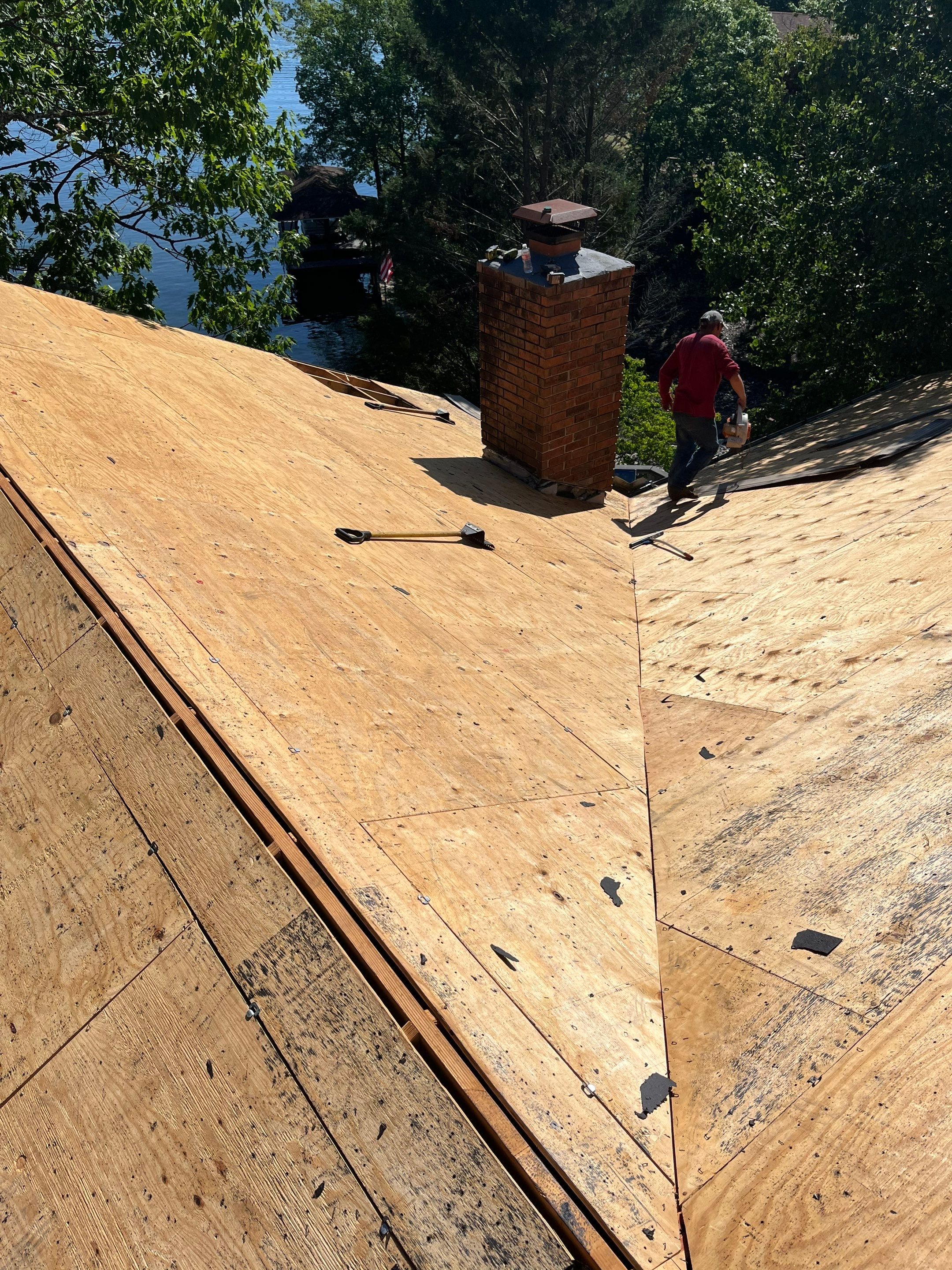 Architectural Shingle Roof Replacement and Skylight Installation in Hot Springs Village by Temple Roofing and Exteriors
