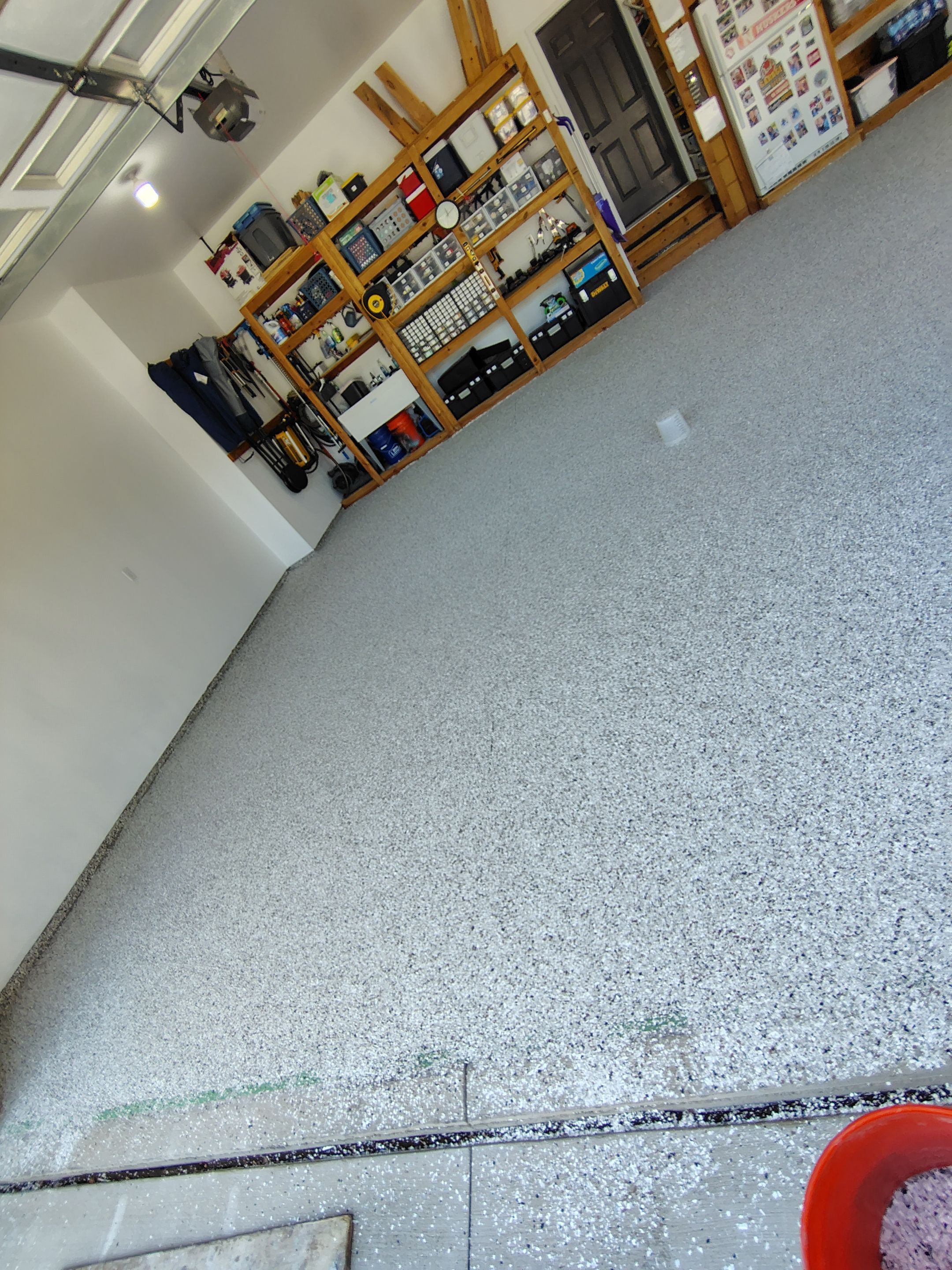 Coyote Garage Floor Coating in Sioux Falls by Select Painting, Coatings & Garage Cabinets