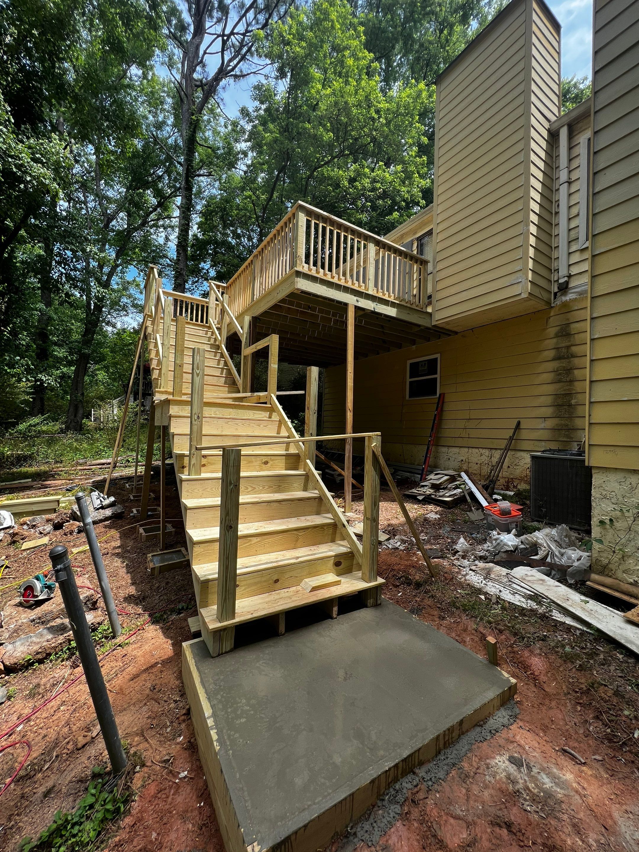 Elevated Wood Deck and Blue Lap Siding Installation in Kennesaw by Swift Home Renovations