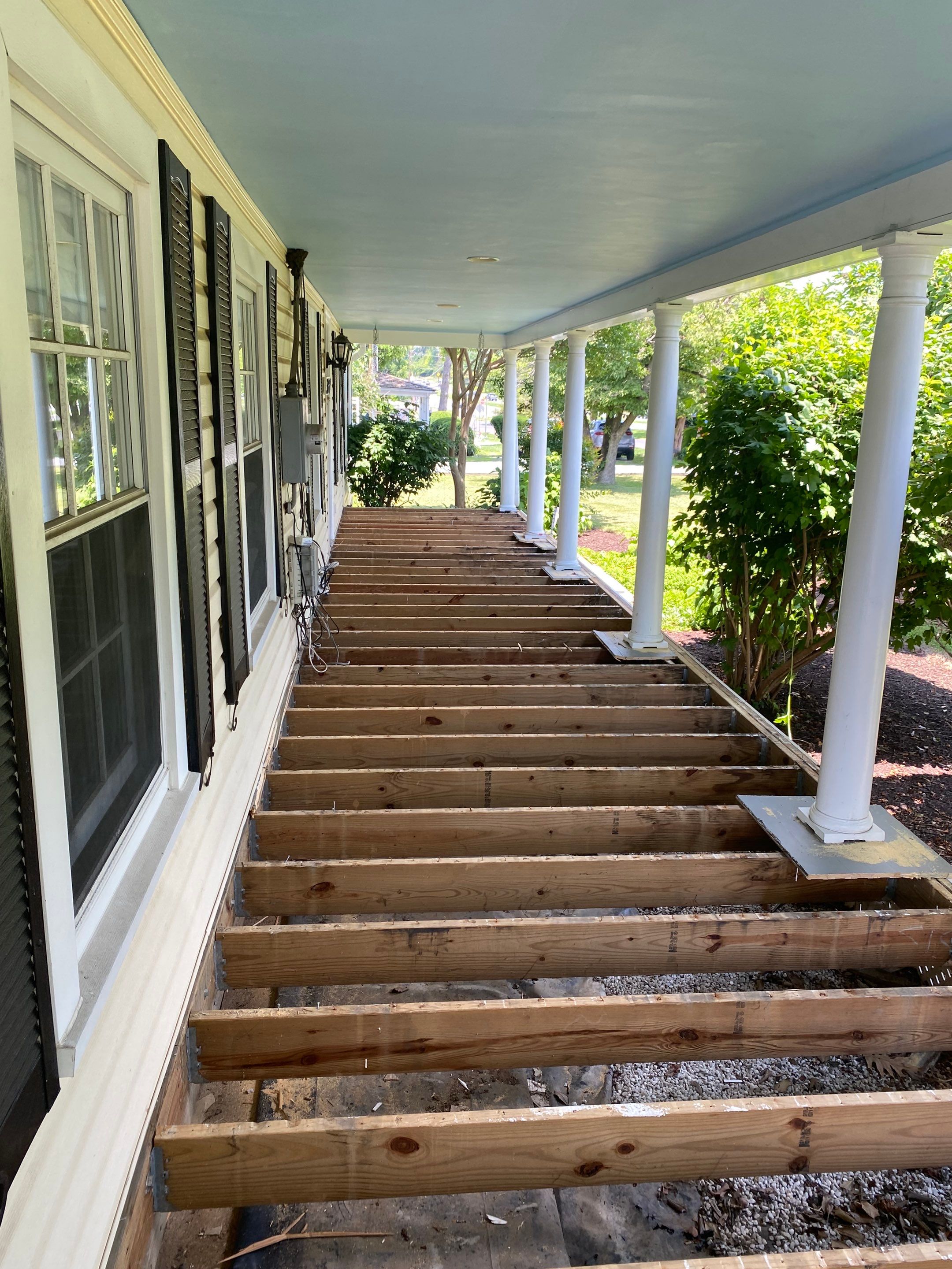 Front Porch Transformation using Timbertech Decking by The Smet Companies, LLC