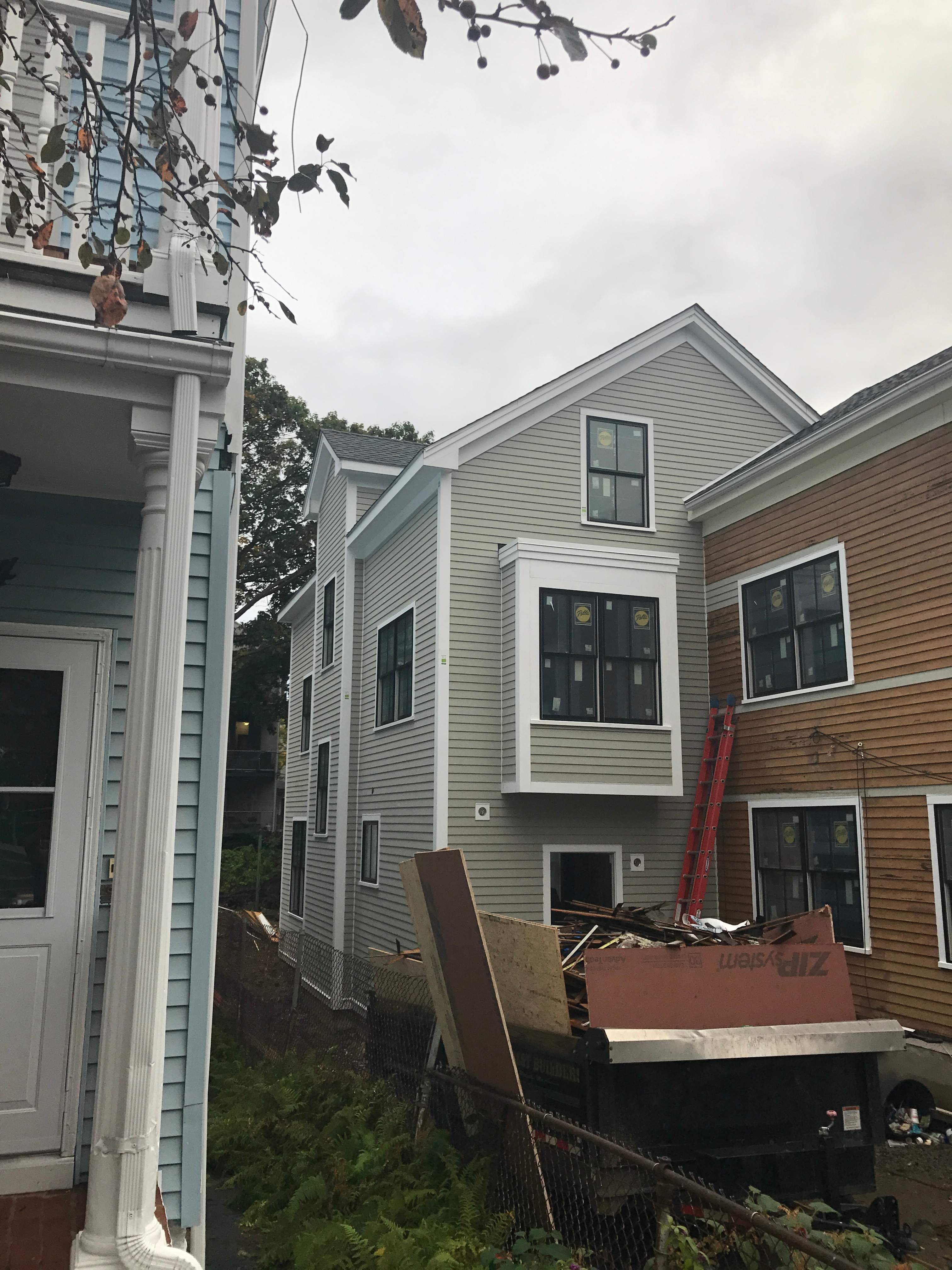 Siding Installation using Wood Clapboards by UBrothers Construction