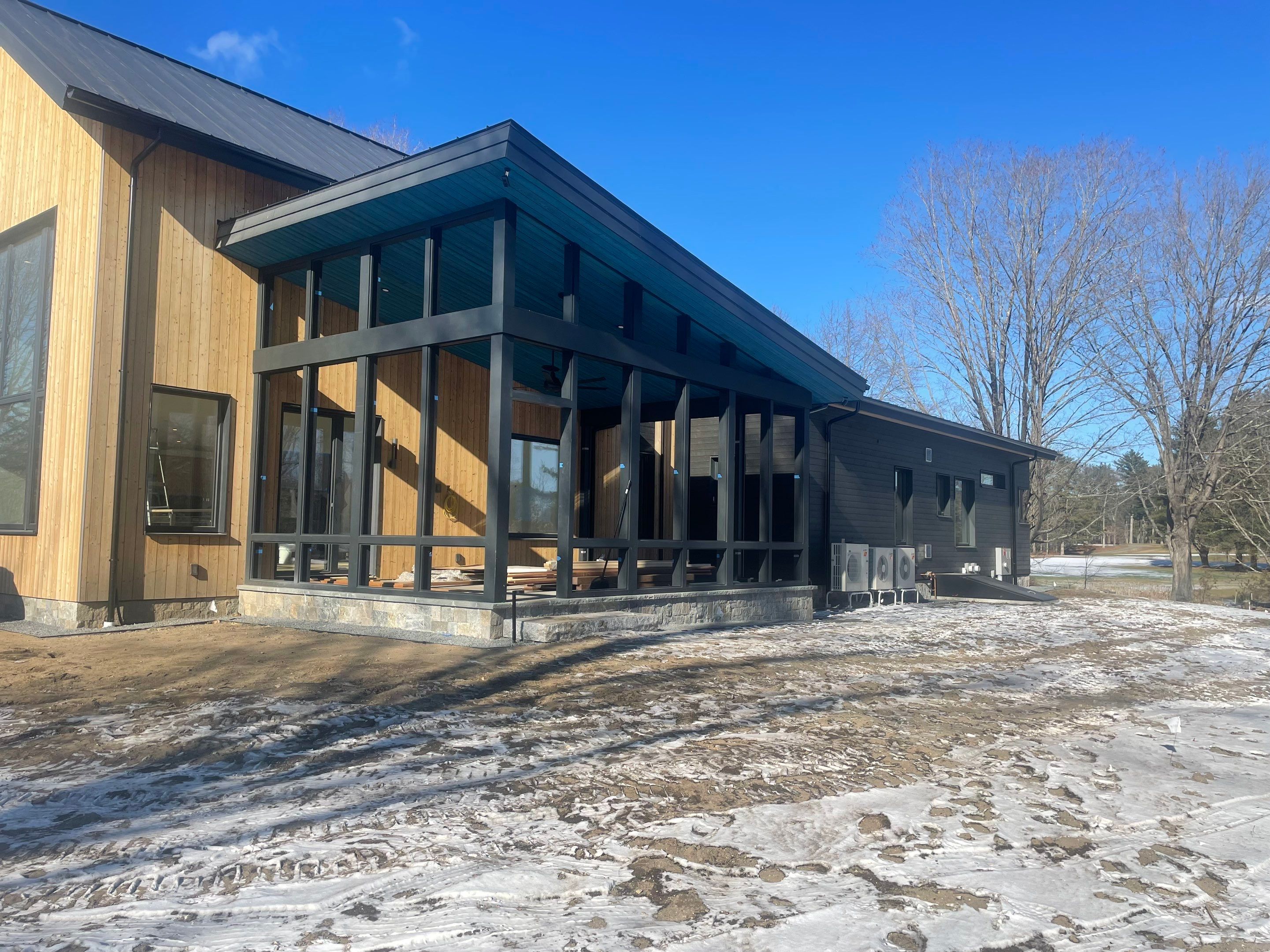 Gutter Installation using 6" Half Round Aluminum Gutter with 3" plain round aluminum downspouts and with a vinyl wedge buildout in Stow, MA. by Gutter Pro Enterprises